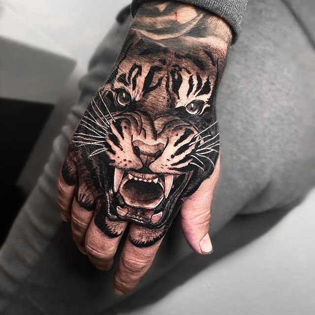 Details 93+ about japanese tiger hand tattoo super cool -  .vn