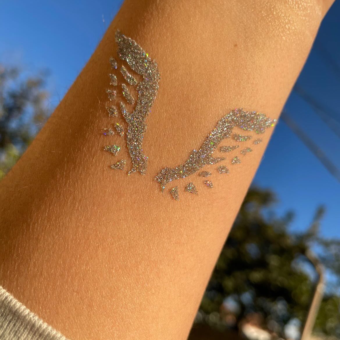 Glitter Wings Temporary Tattoo on Arm