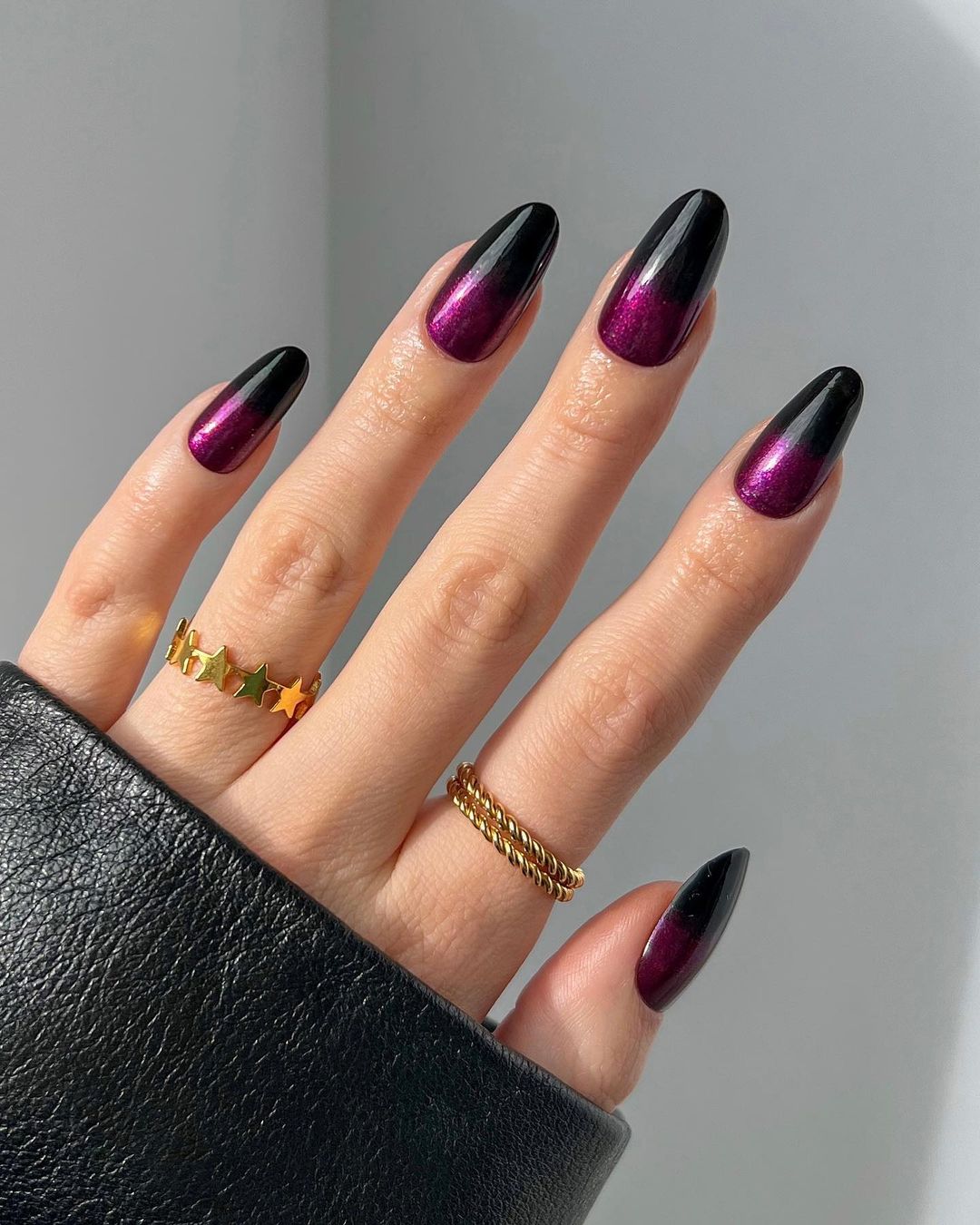 Round Black and Purple Glitter Nails