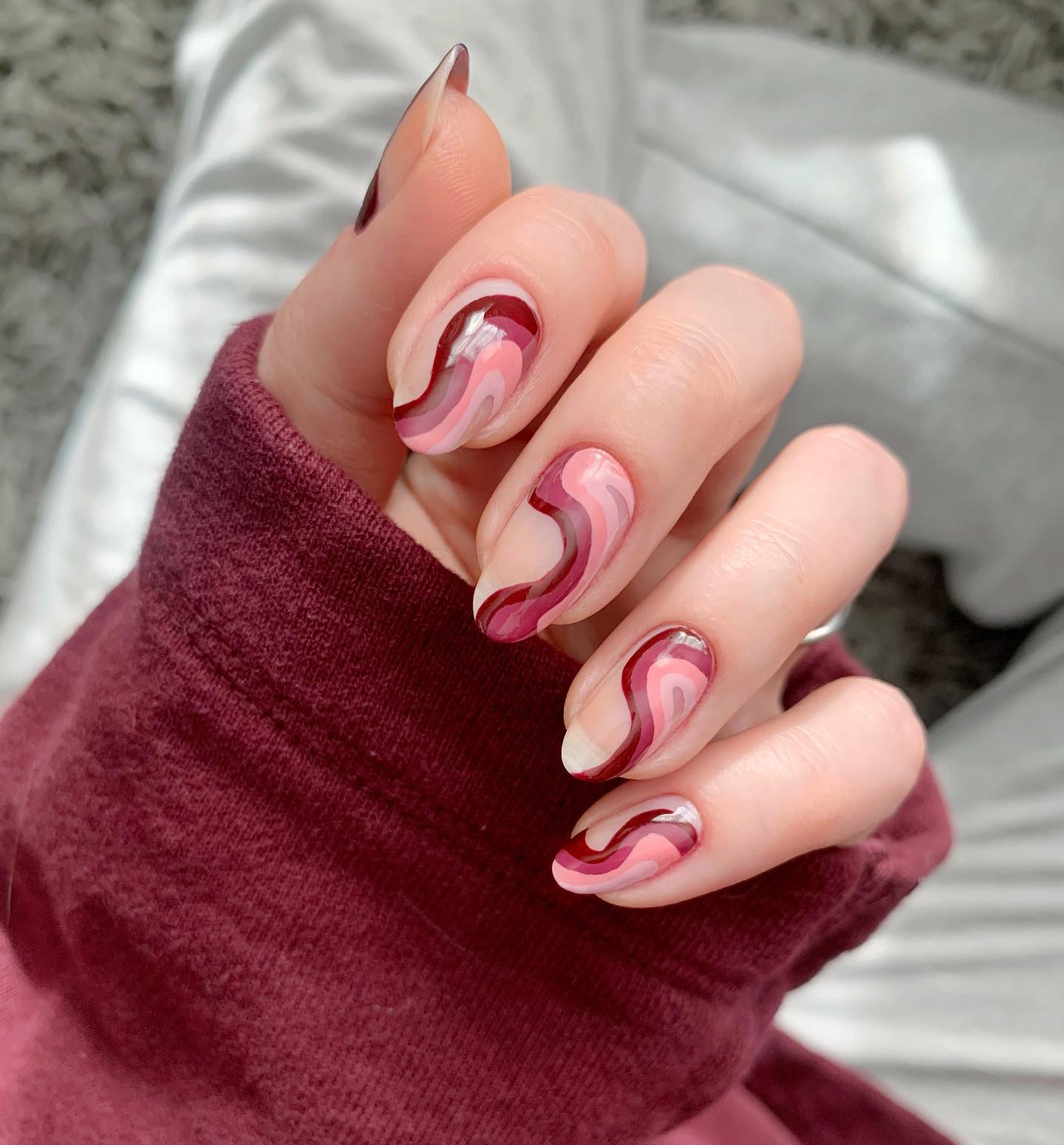 Short Almond Burgundy Nails with Swirls