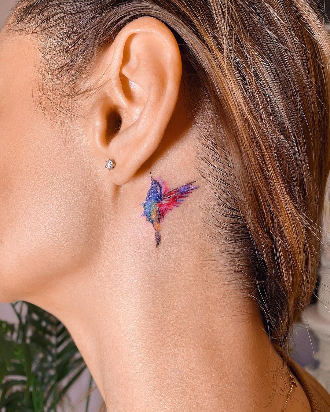Small Colorful Hummingbird Tattoo on Neck
