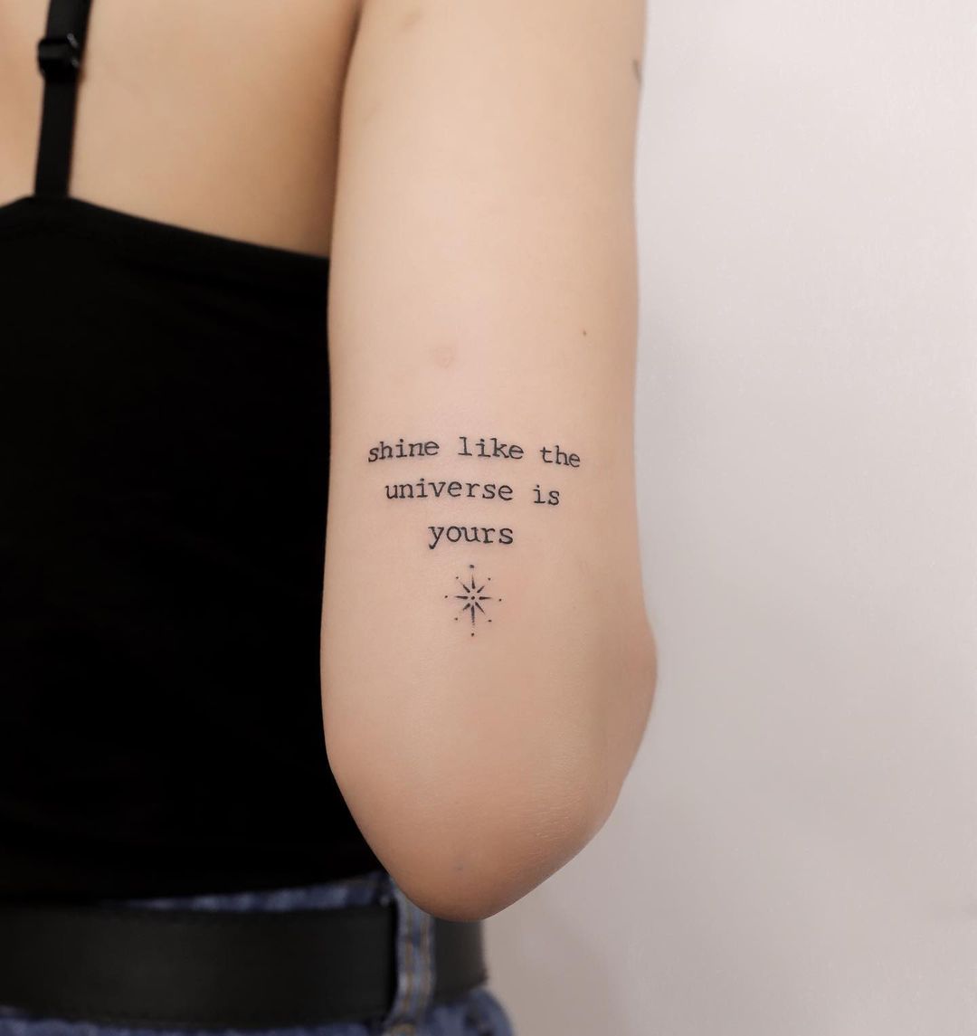Black Ink Quote Tattoo on Back of Arm