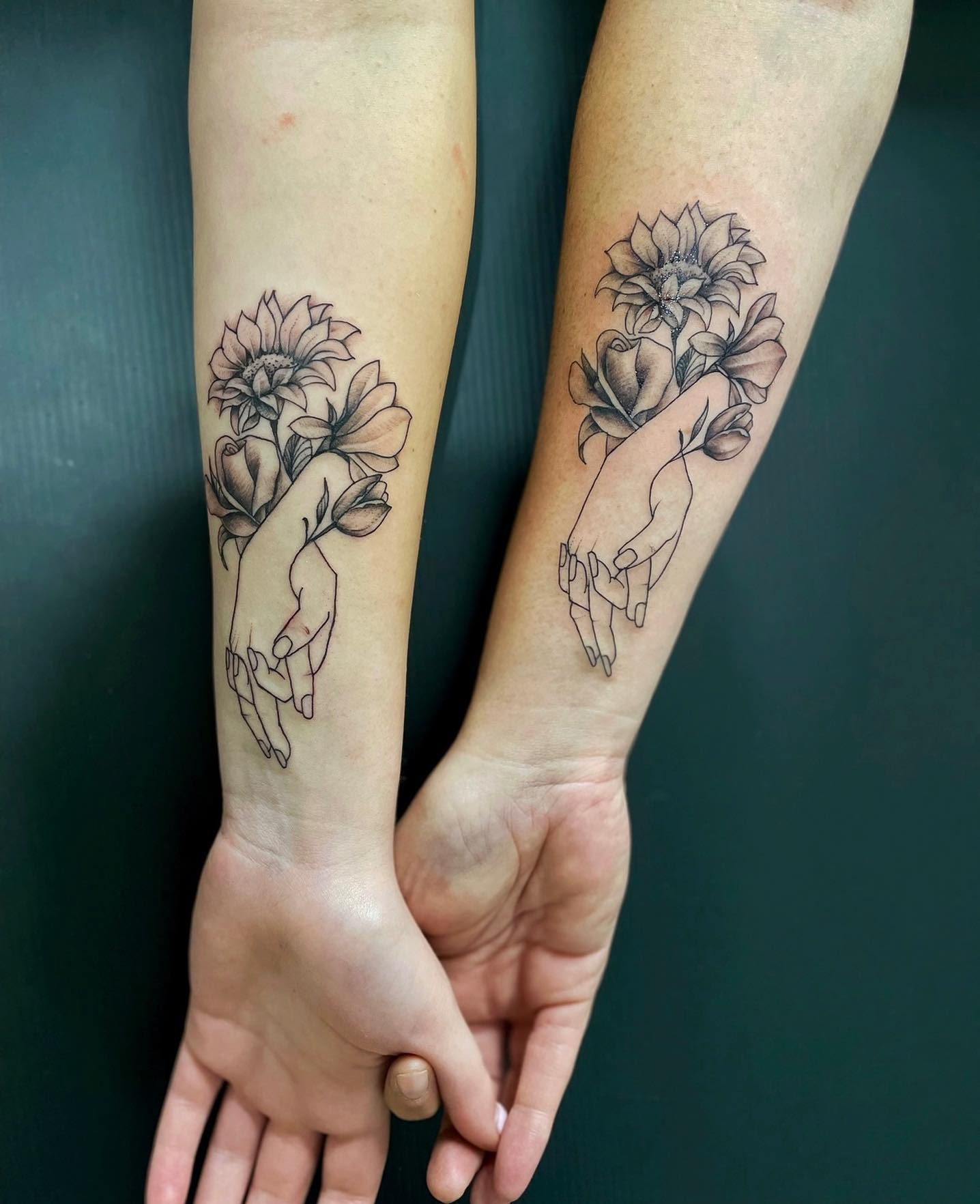 Holding Hands Tattoo with Flower for Mom and Daughter