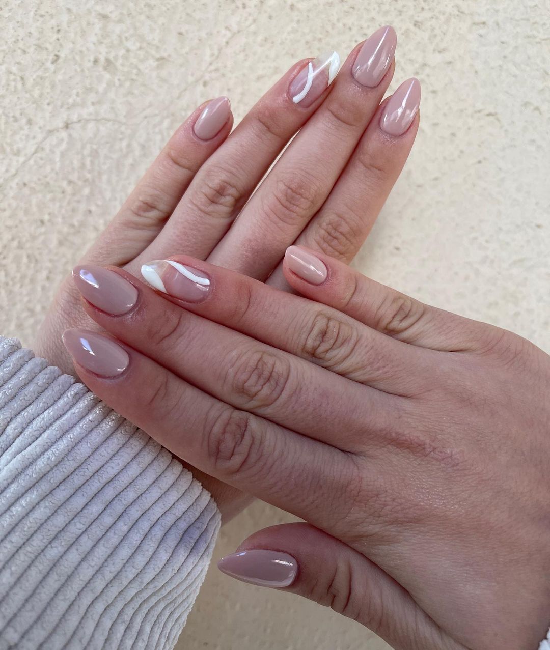 Flattering and wearable nude oval nail design