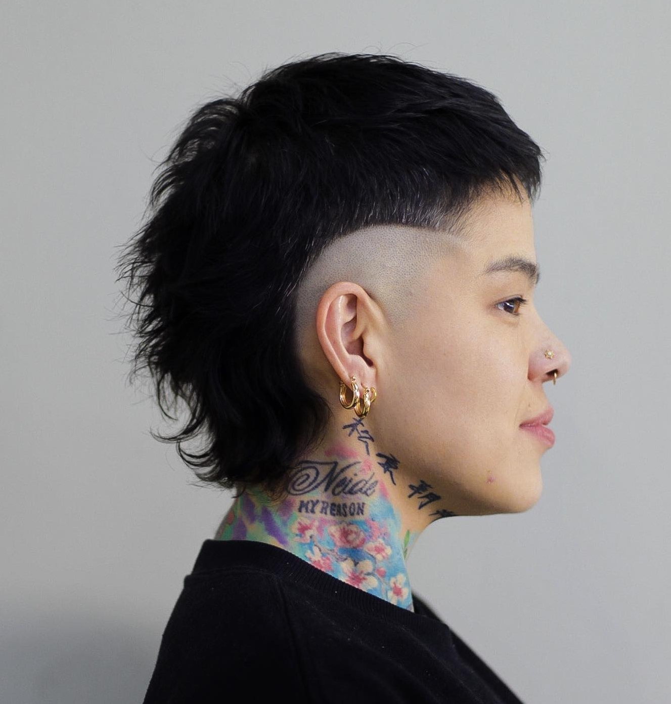 Buzz Cut Mullet with Shaved Sides on Black Hair