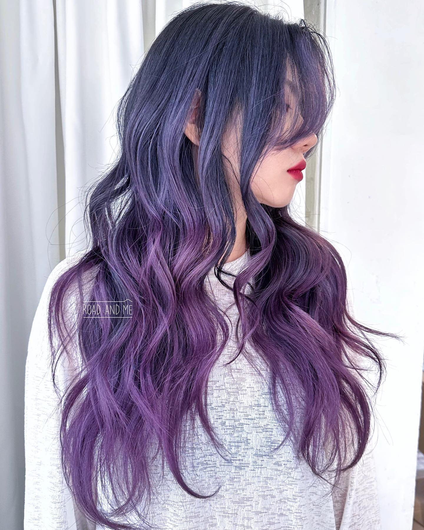 Lavender Balayage on Long Wavy Hair