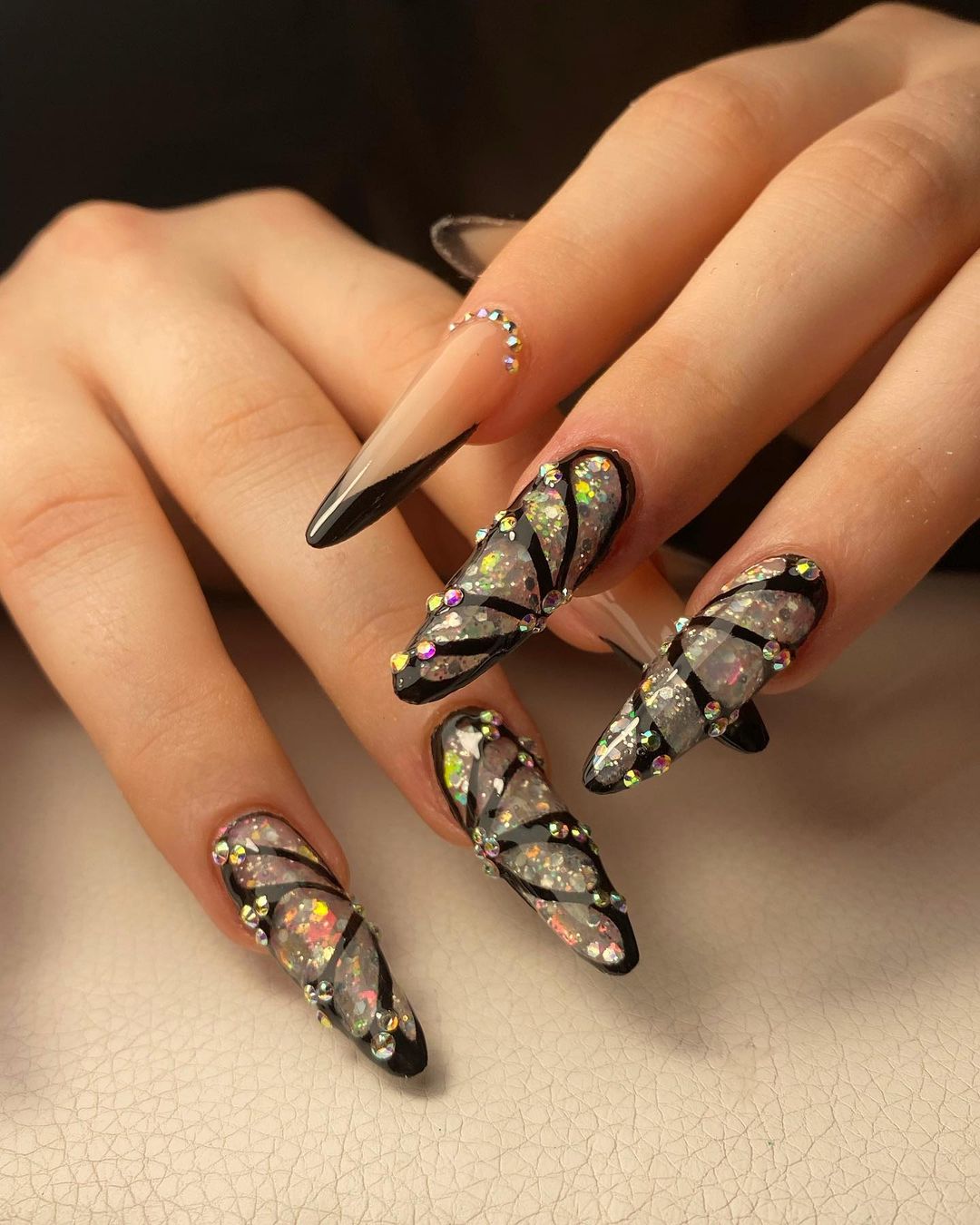 Long Nails with Diamonds and Butterfly Design