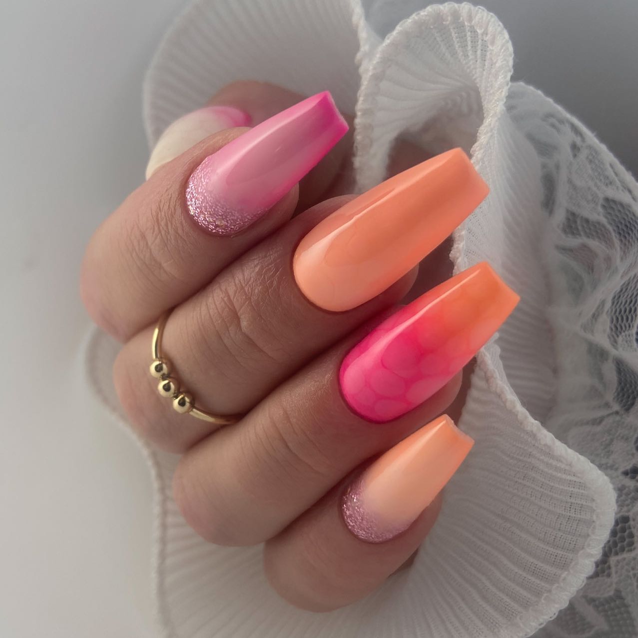 Pastel Orange Nails with Glitter