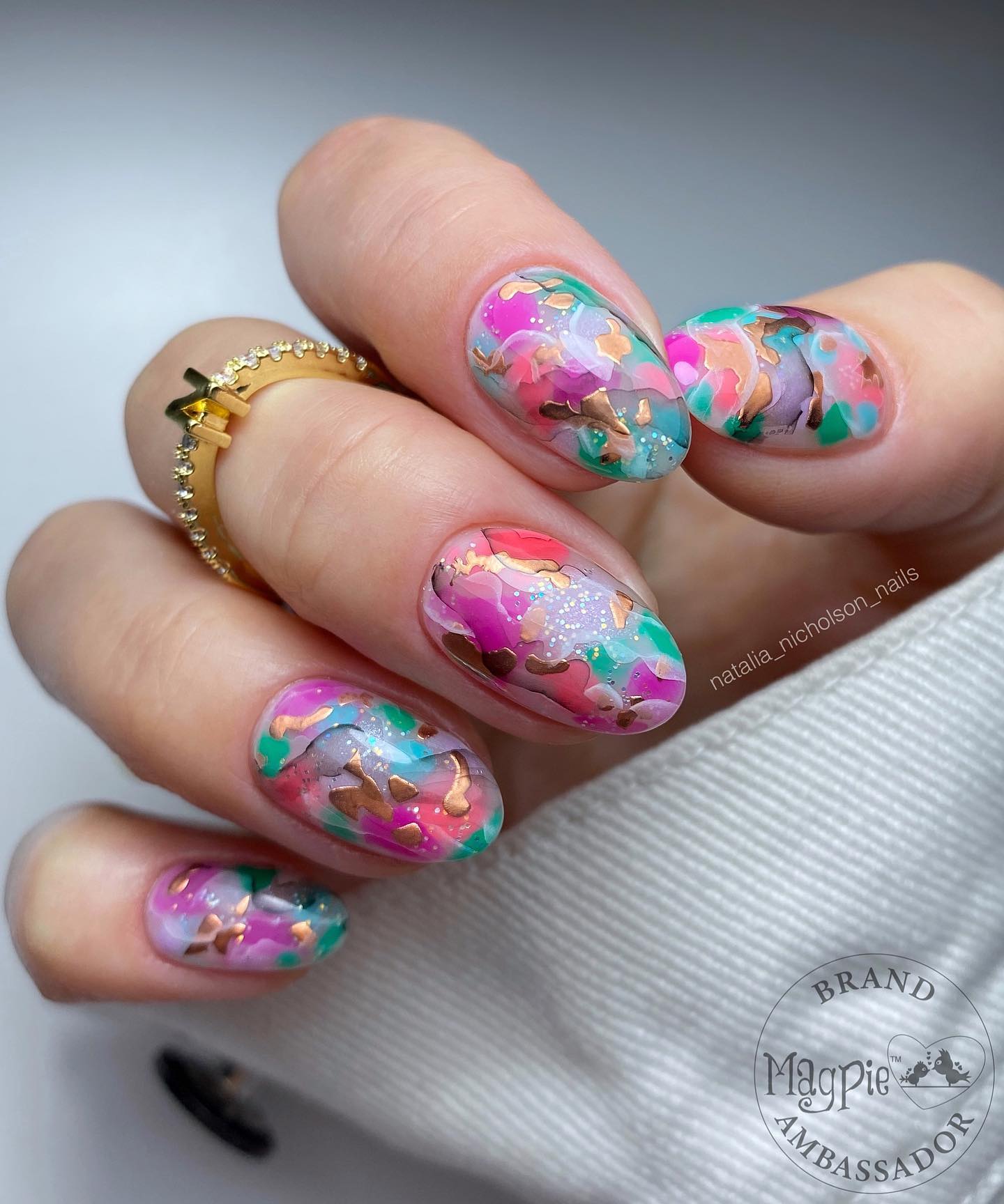 Pink Marble Design on Oval Nails