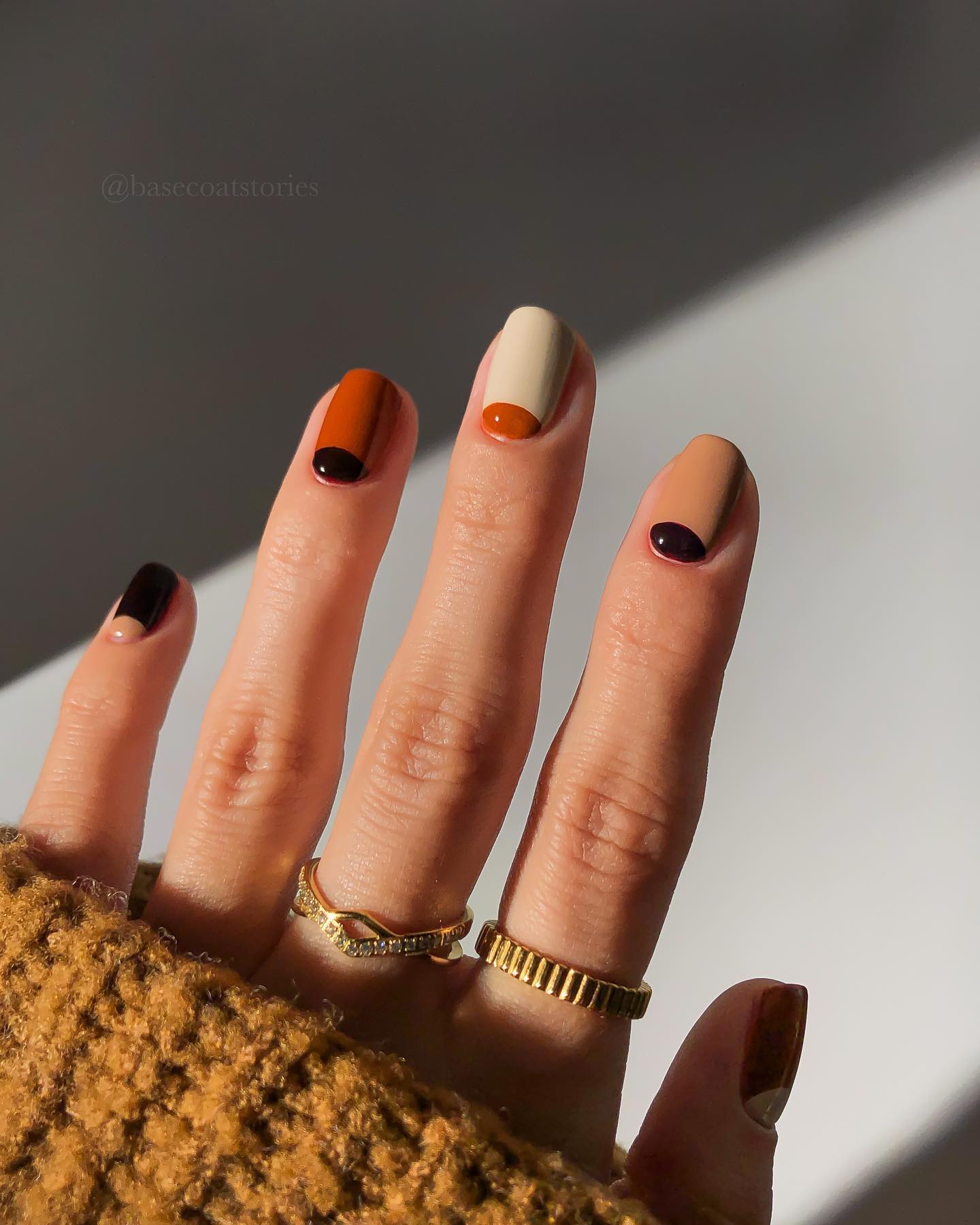 Short Brown Nails with Black Design