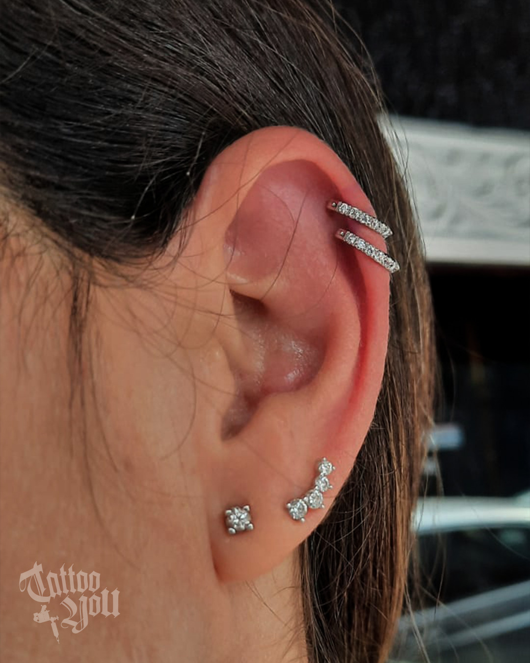 Stacked Ear Piercing Using Elegant Jewelry