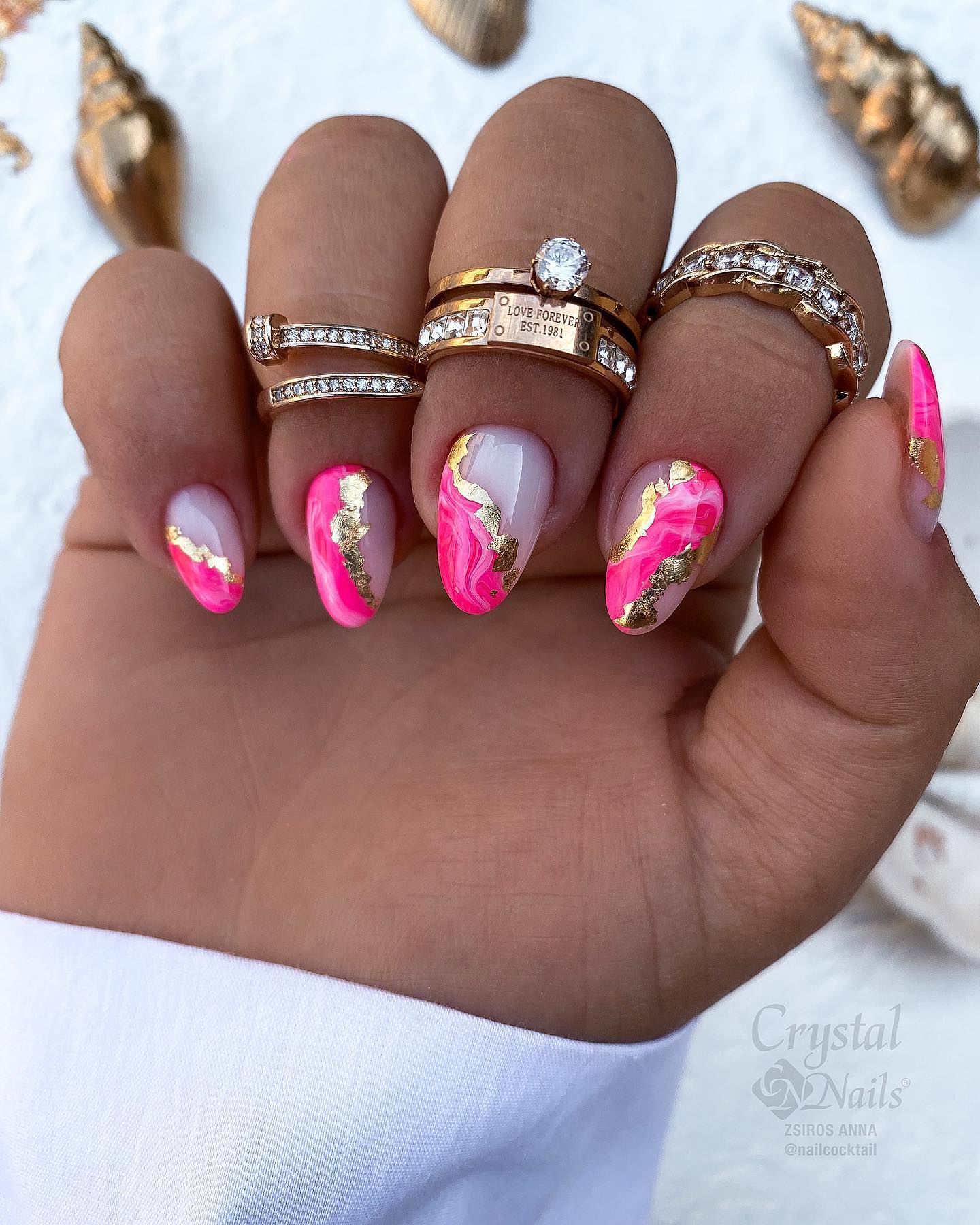 Bright Pink Marble Design on Short Oval Nails