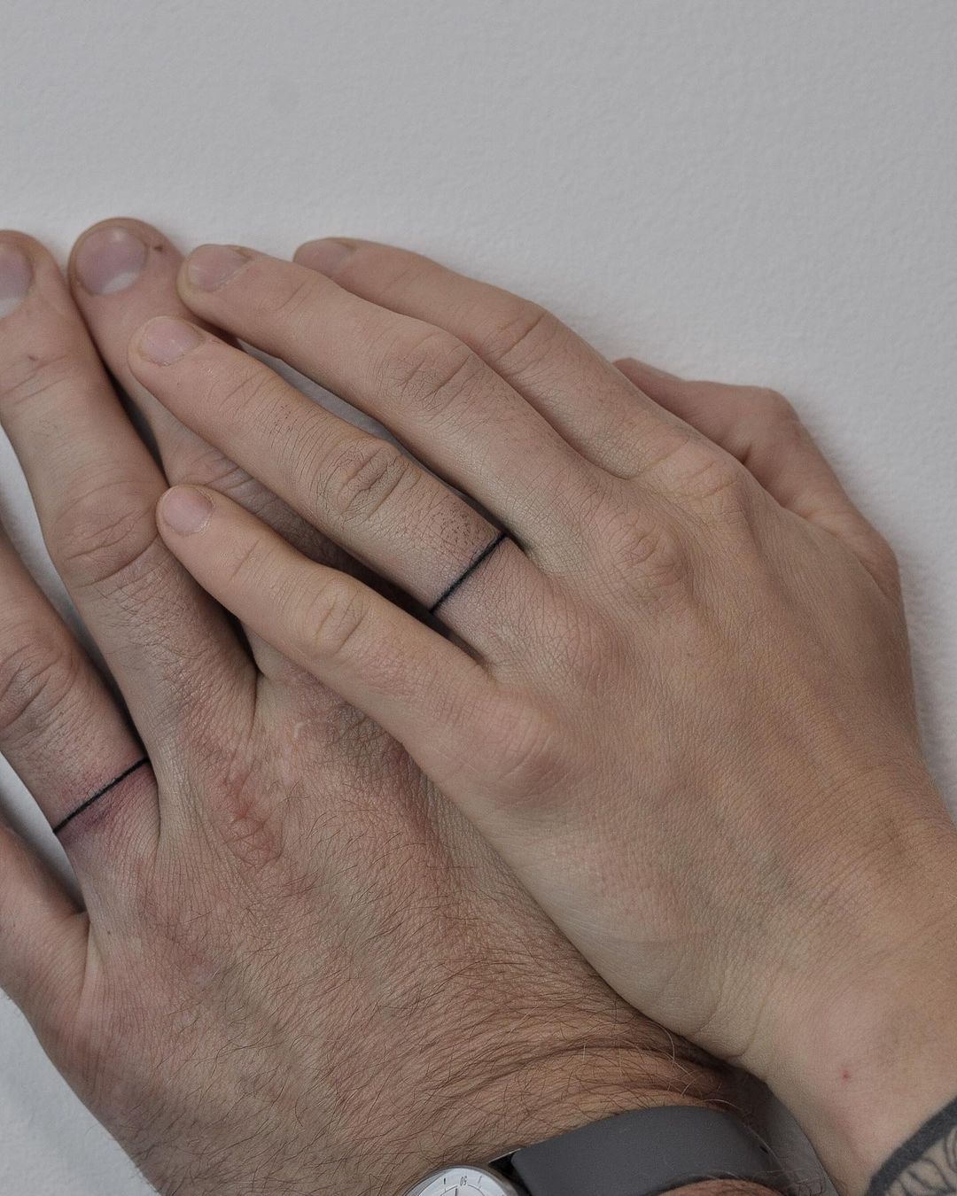 Matching Ring Tattoos on Ring Fingers