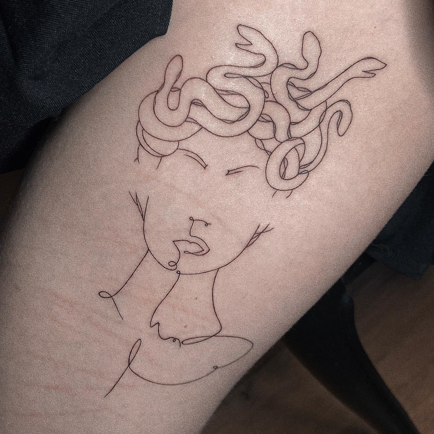 Minimalist Medusa Tattoo on Leg