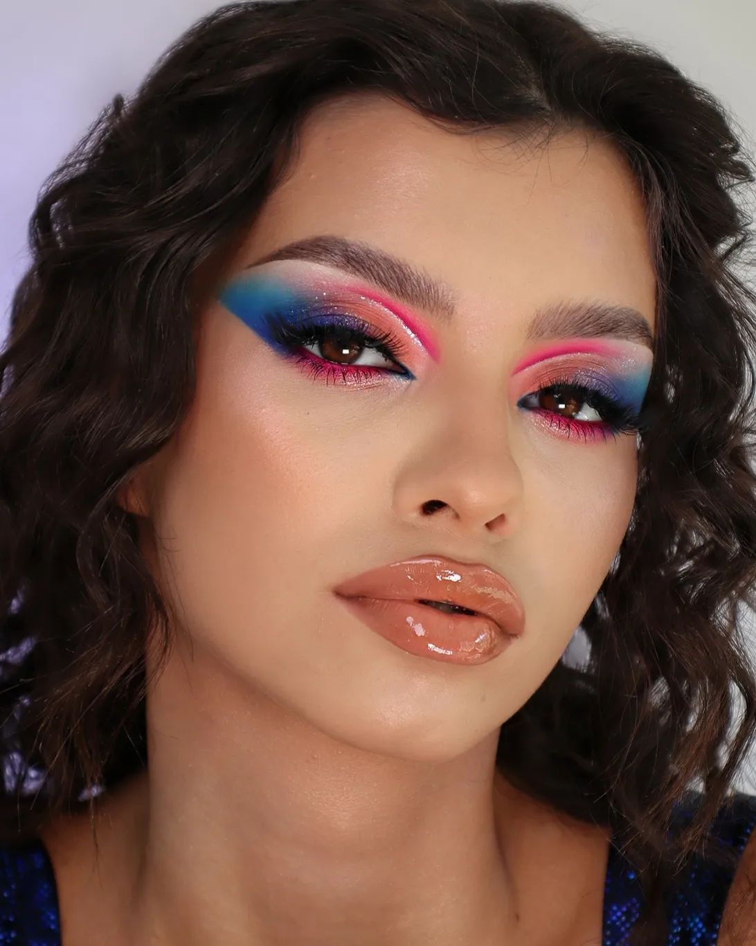 Multi-colored Eye Makeup with Glossy Lips