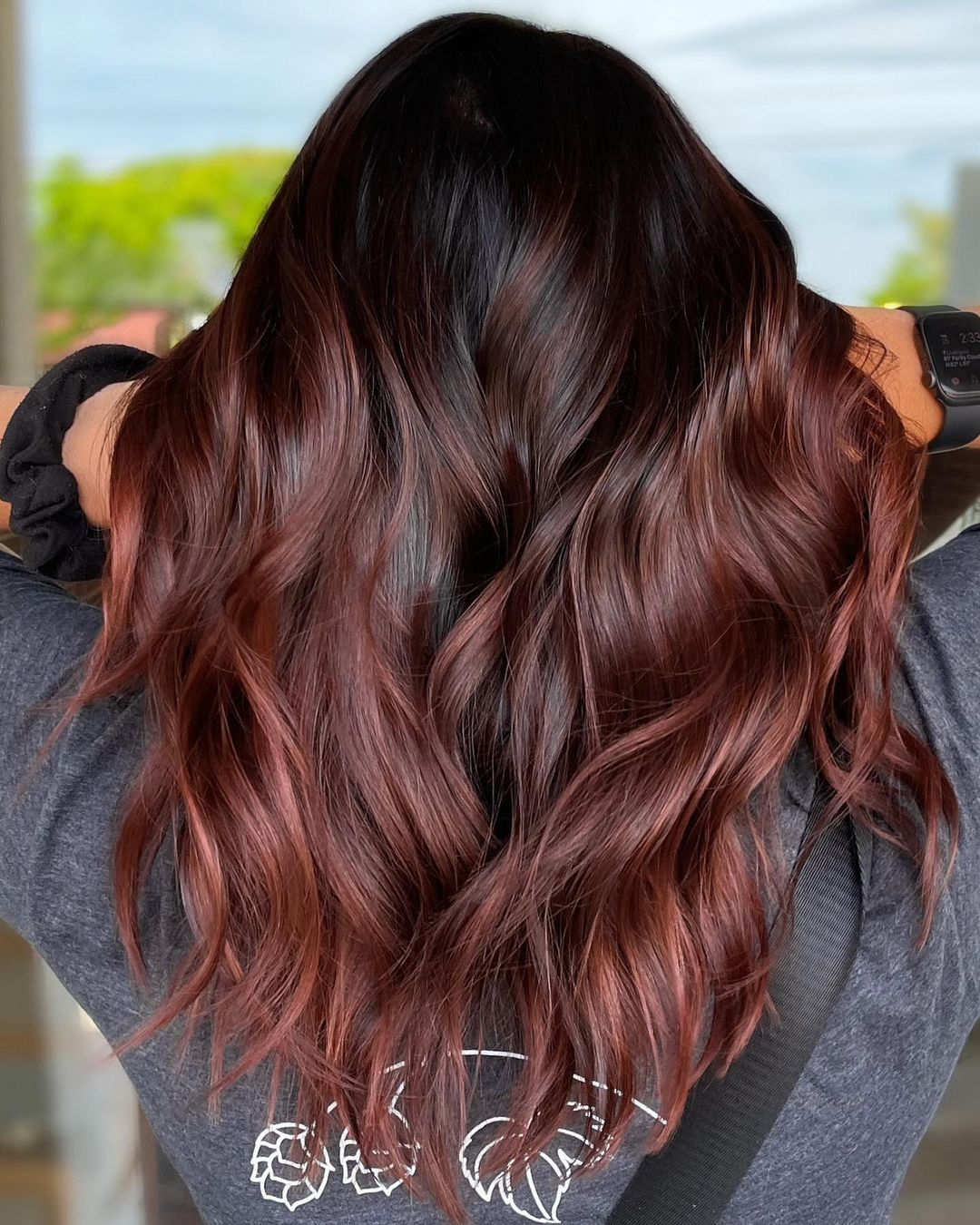 Red Hues on Long Chocolate Hair