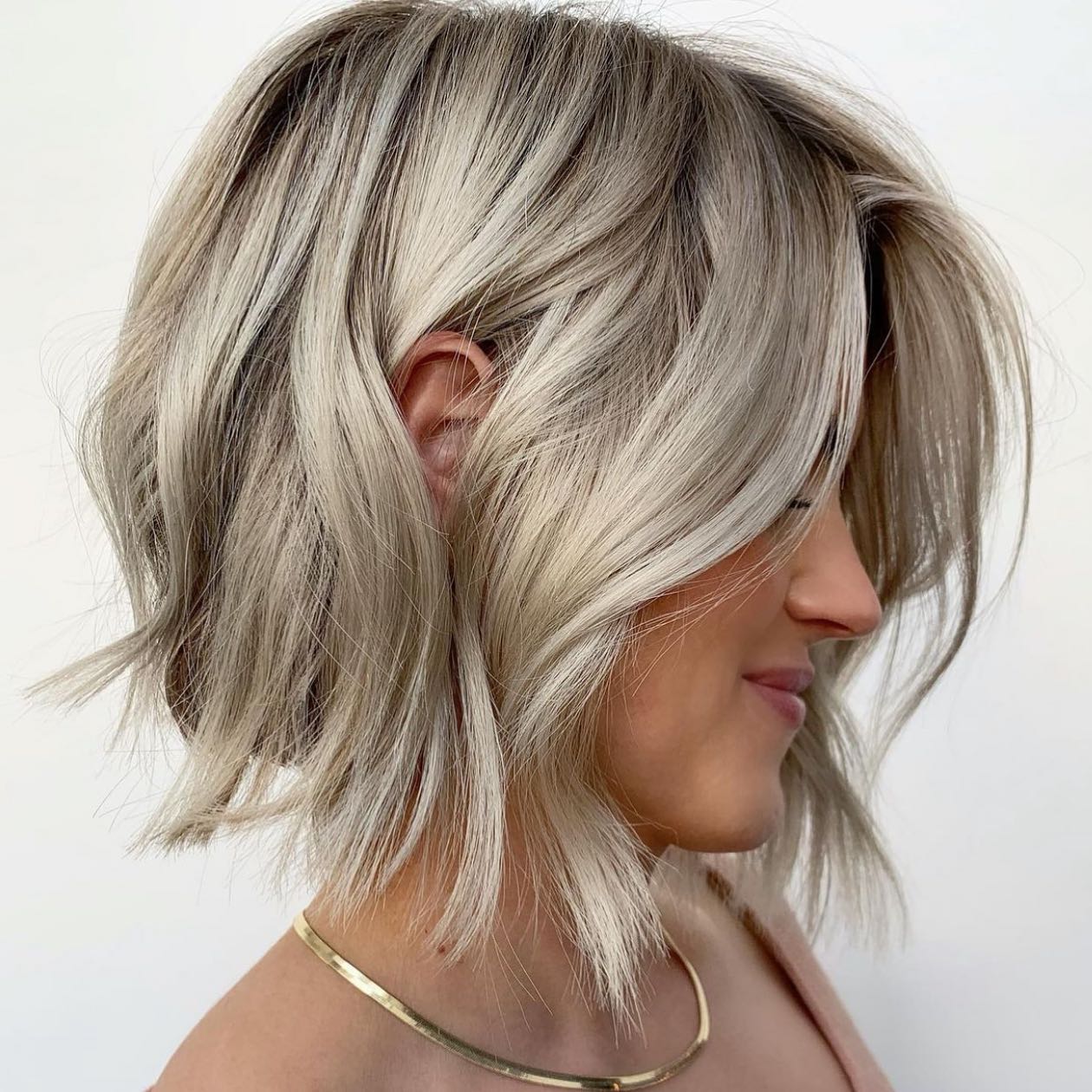 Wavy Angled Blonde Bob Haircut