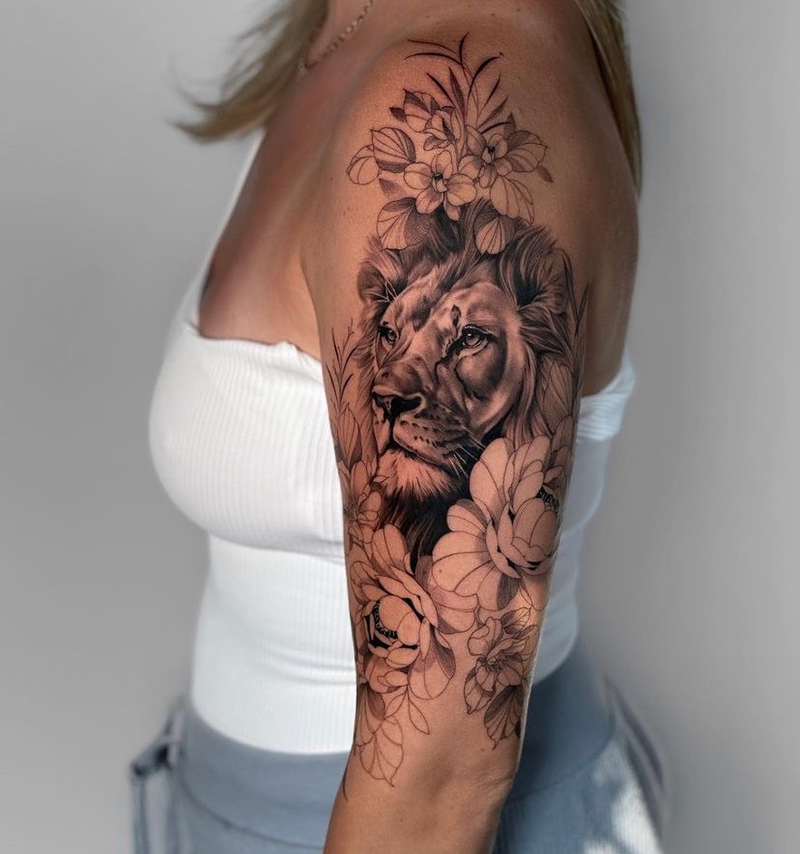 Lion and Flowers Tattoo on Arm
