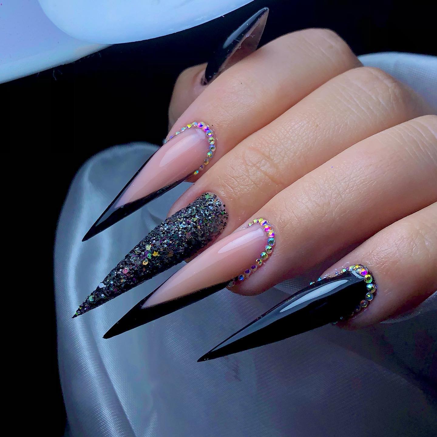 Long Acrylic Stiletto Black Nails with Glitter and Rhinestones
