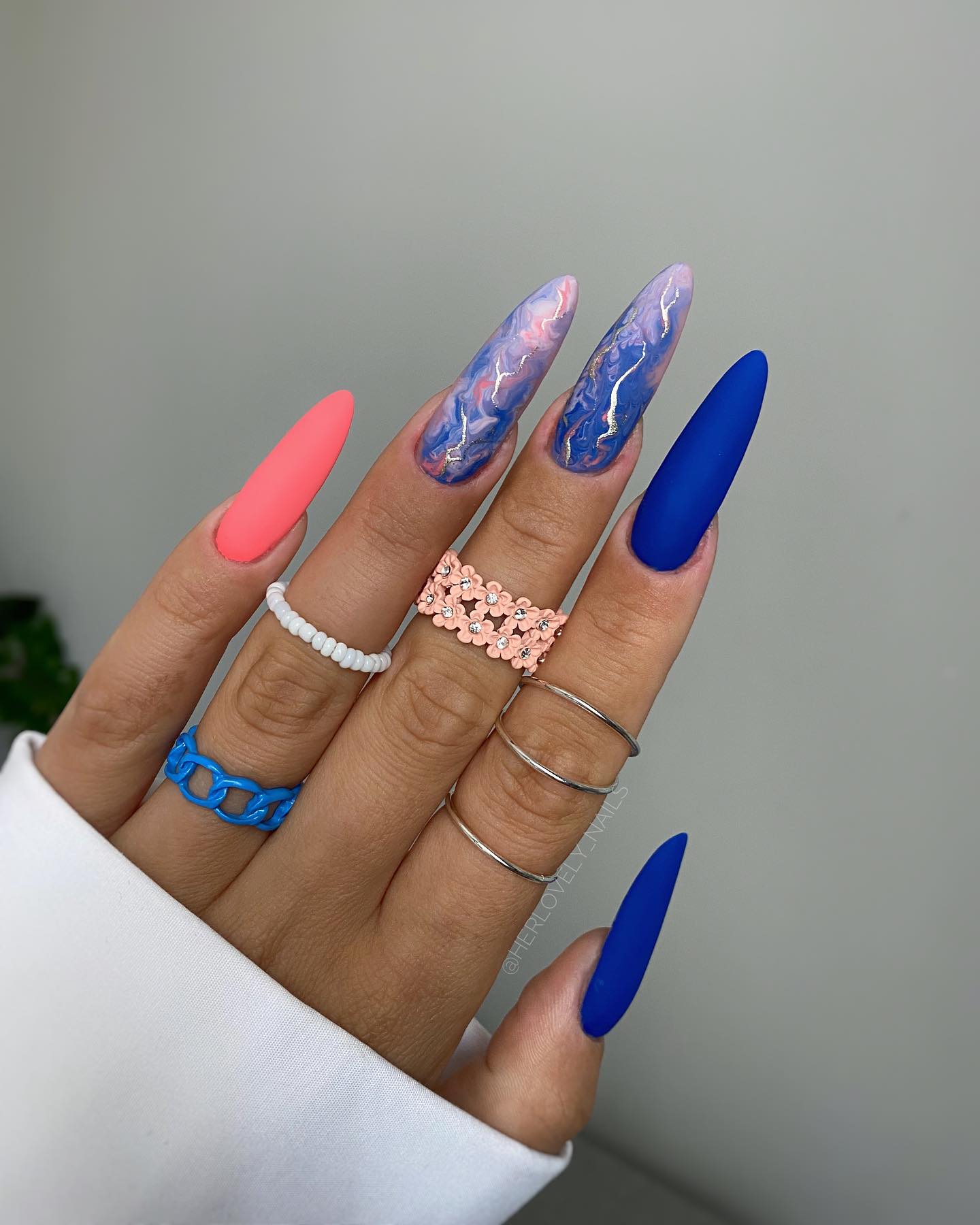 Long Deep Blue Nails with Marble Design