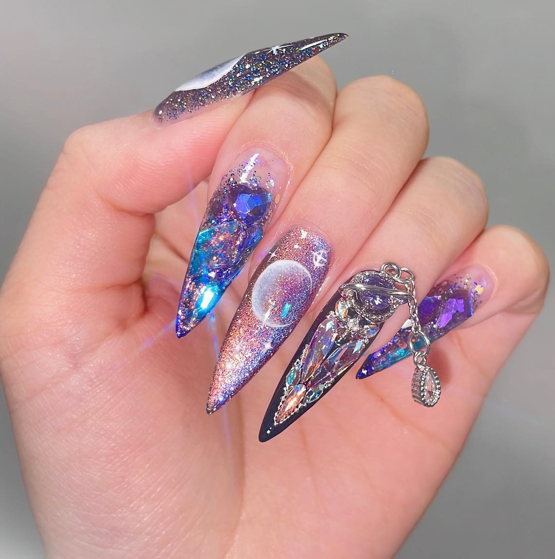 Long Stiletto Sparkly Galaxy Nails
