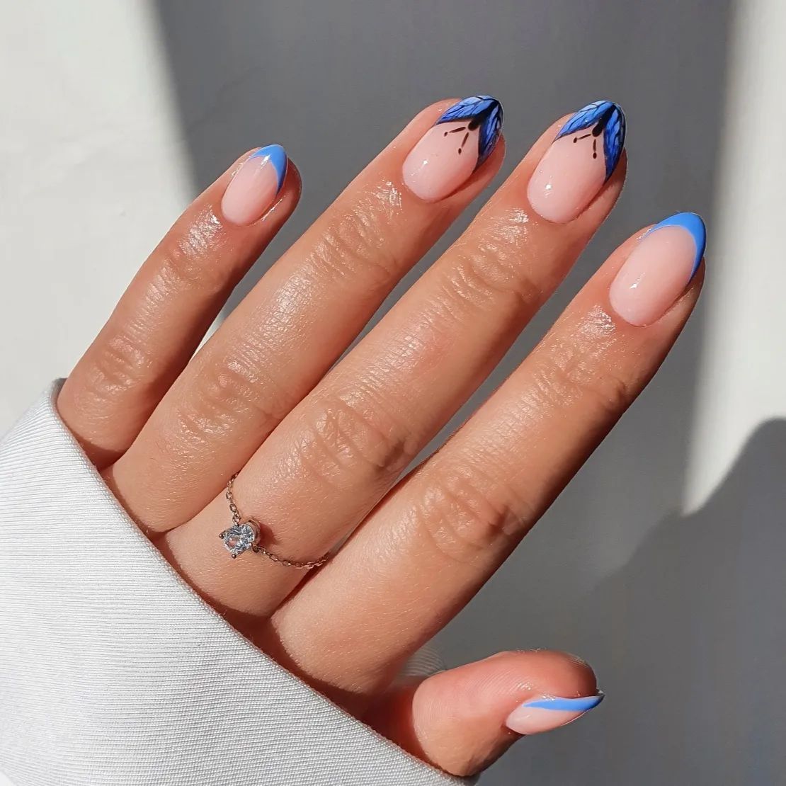 Short Nails with Blue Butterfly Design on Tips