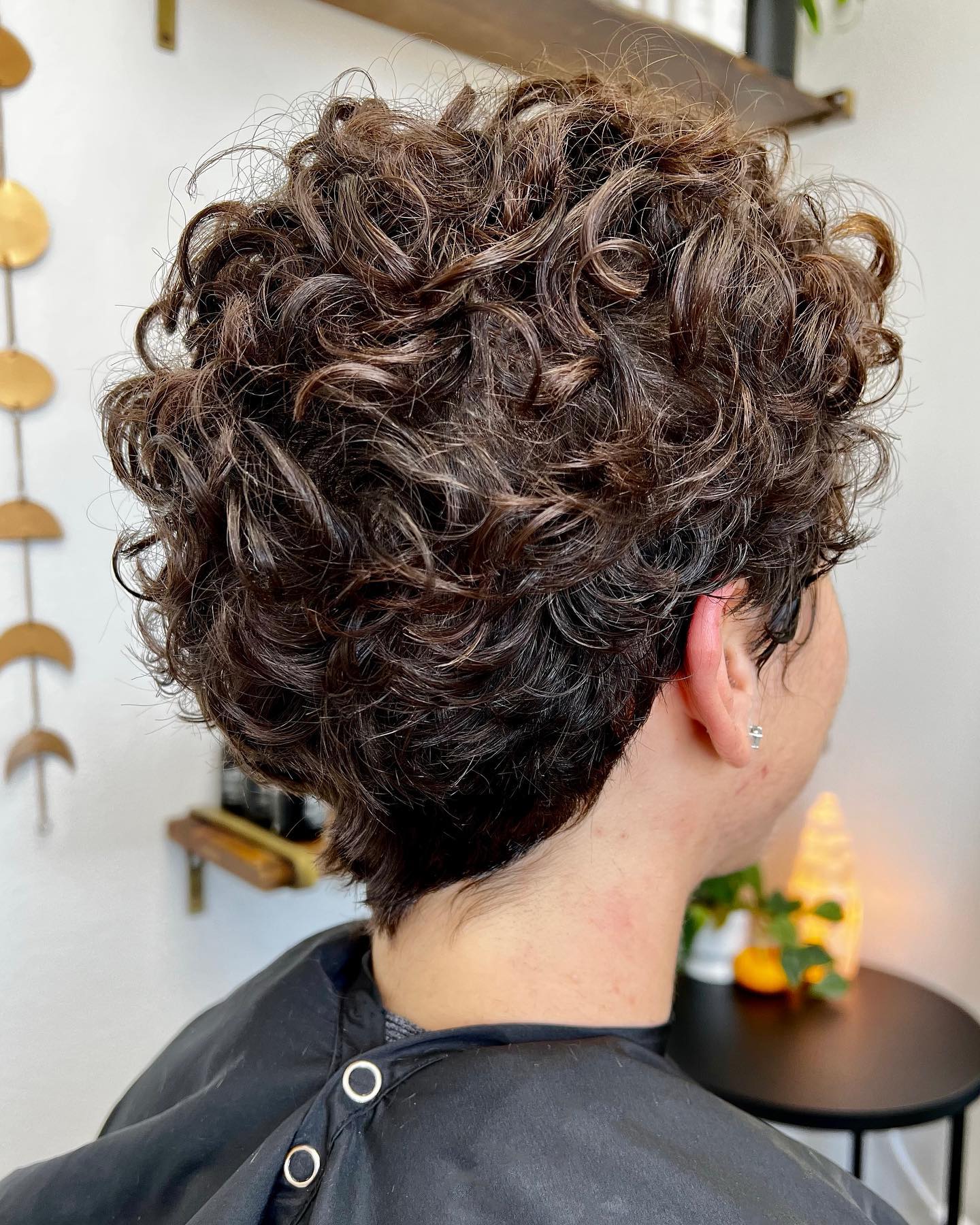 Tomboy Curly Pixie on Dark Hair with Highlights