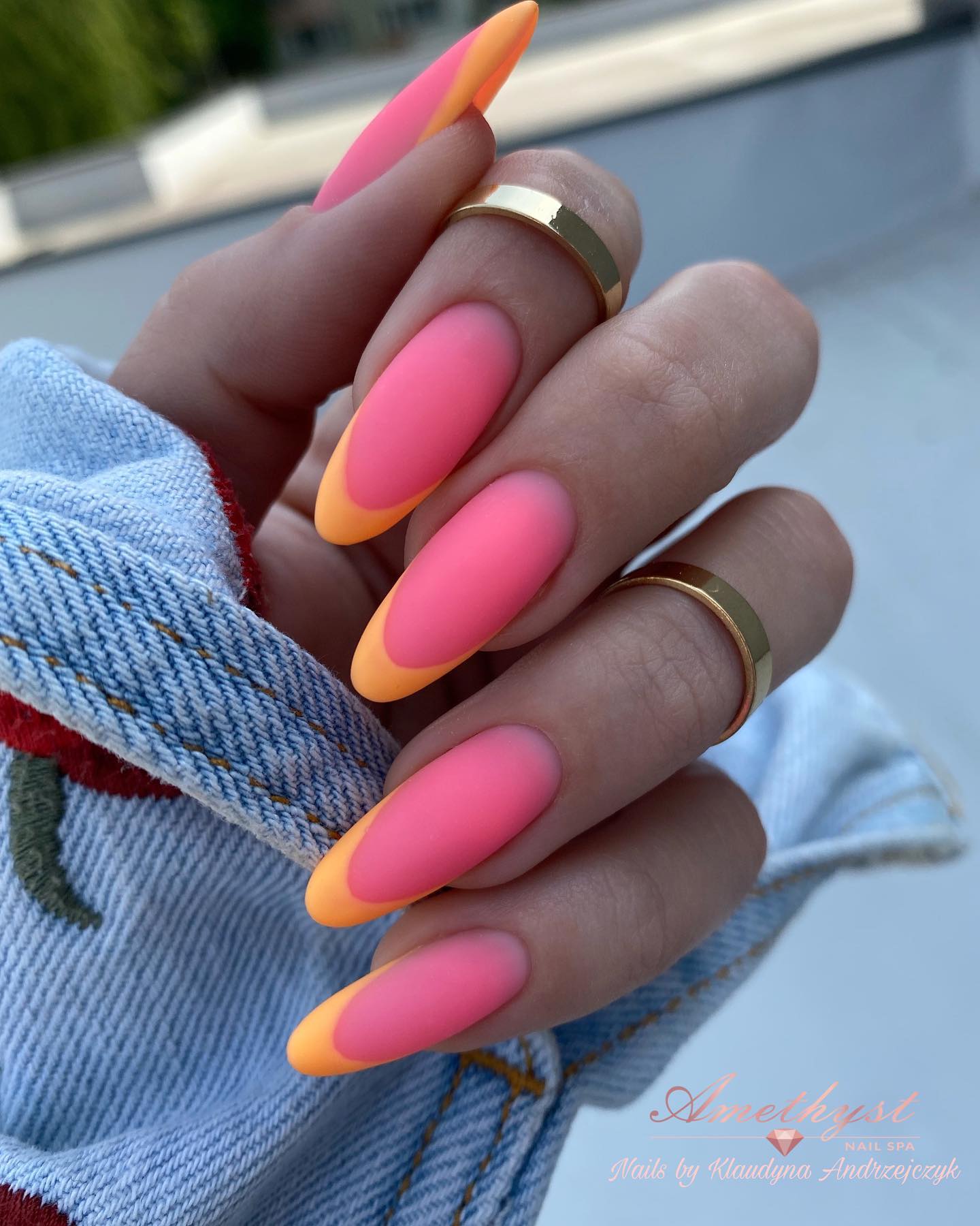 Almond-Shaped Orange French Tip Nails