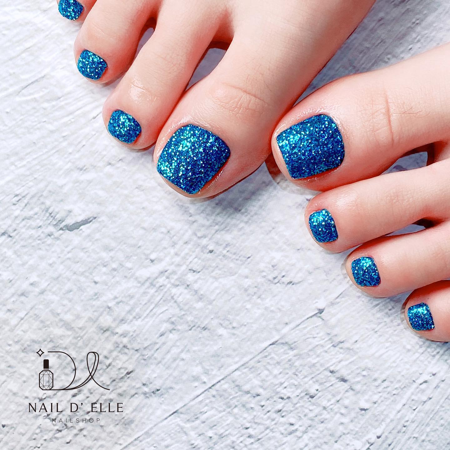 Glitter Blue Toe Nails