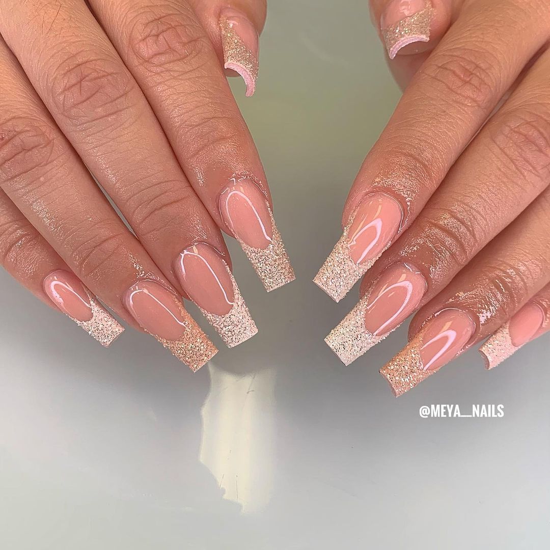 Striking nude sparkly nails