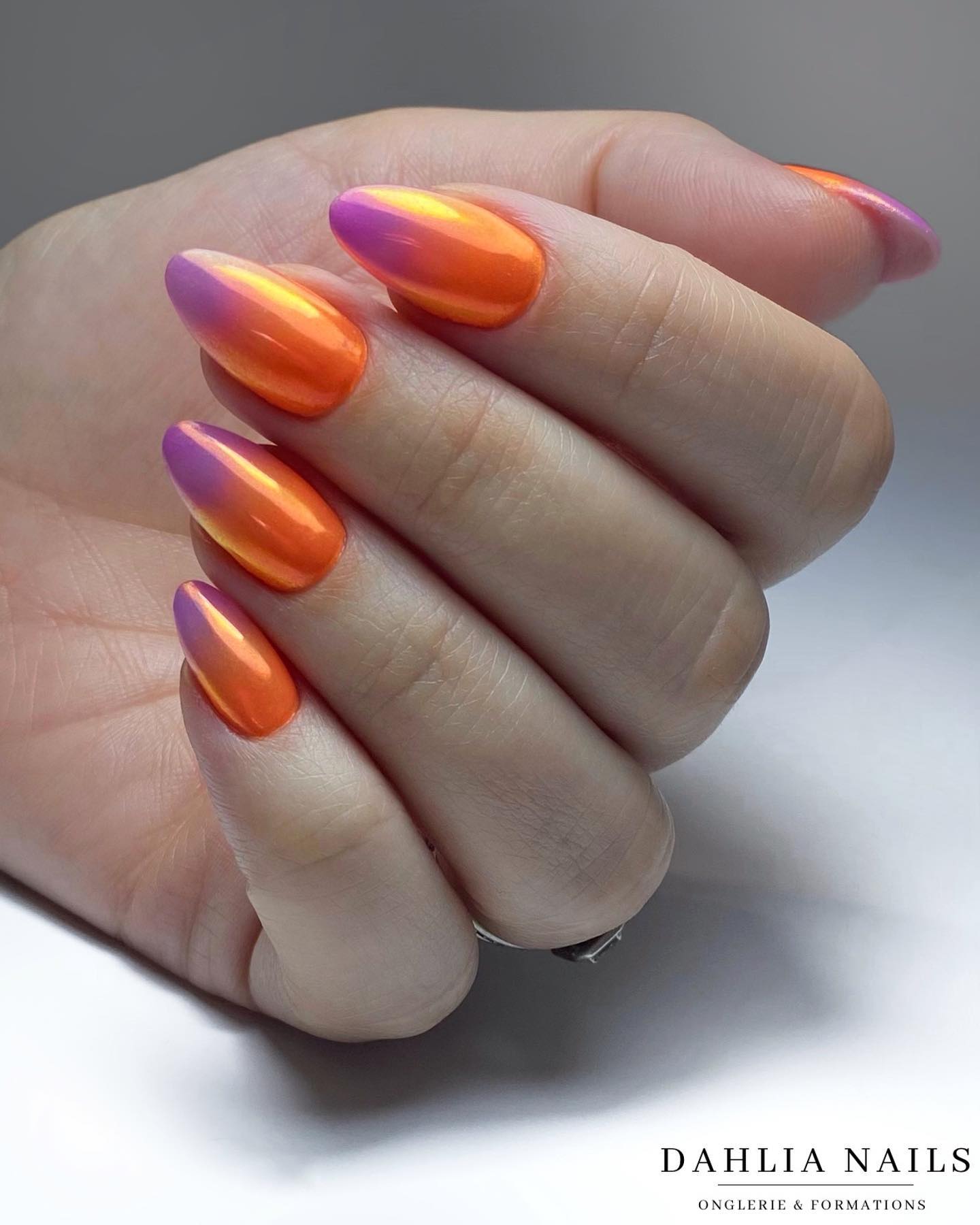 Round Chrome Orange and Purple Nails