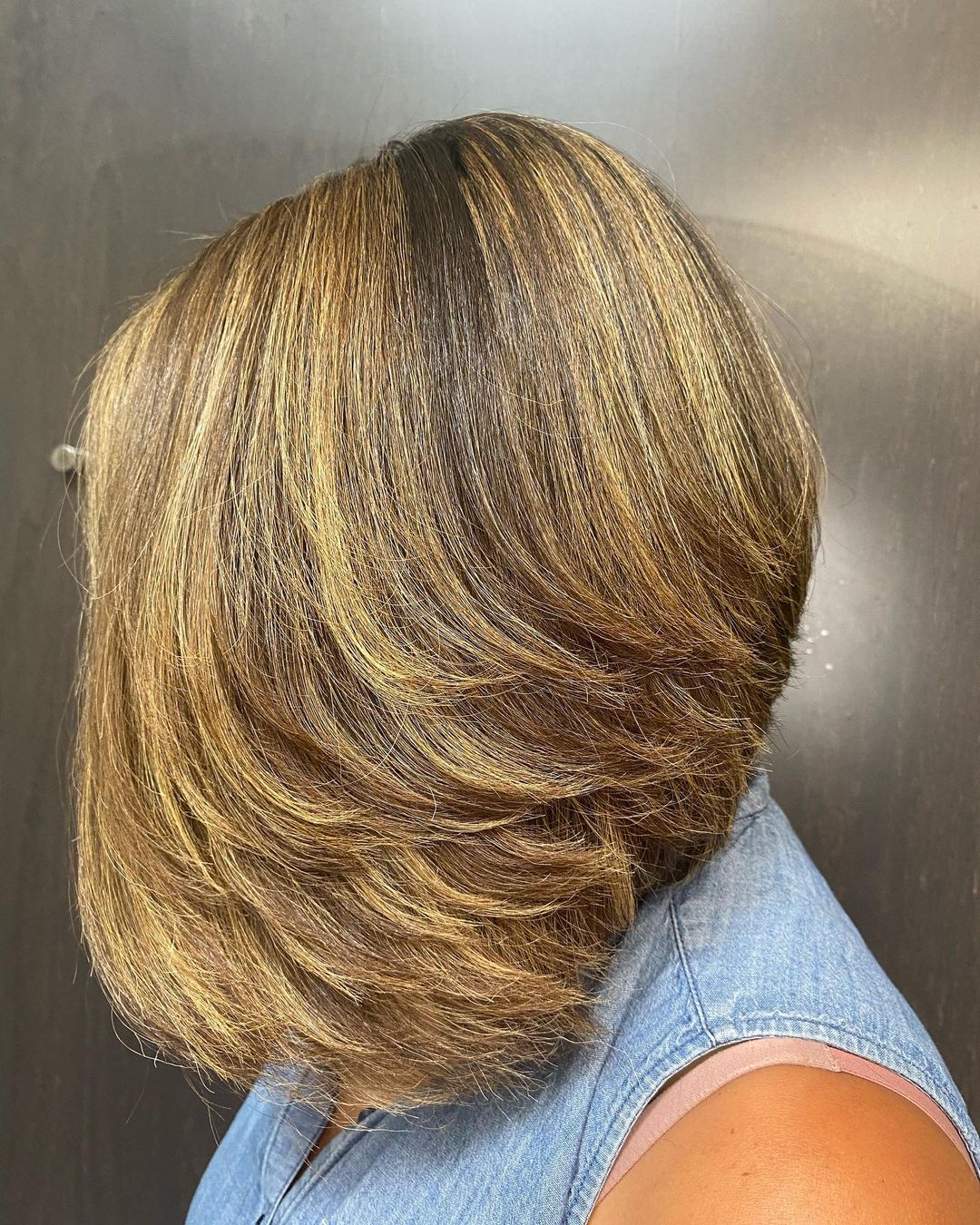 Feathered Bob Cut on Light Brown Hair