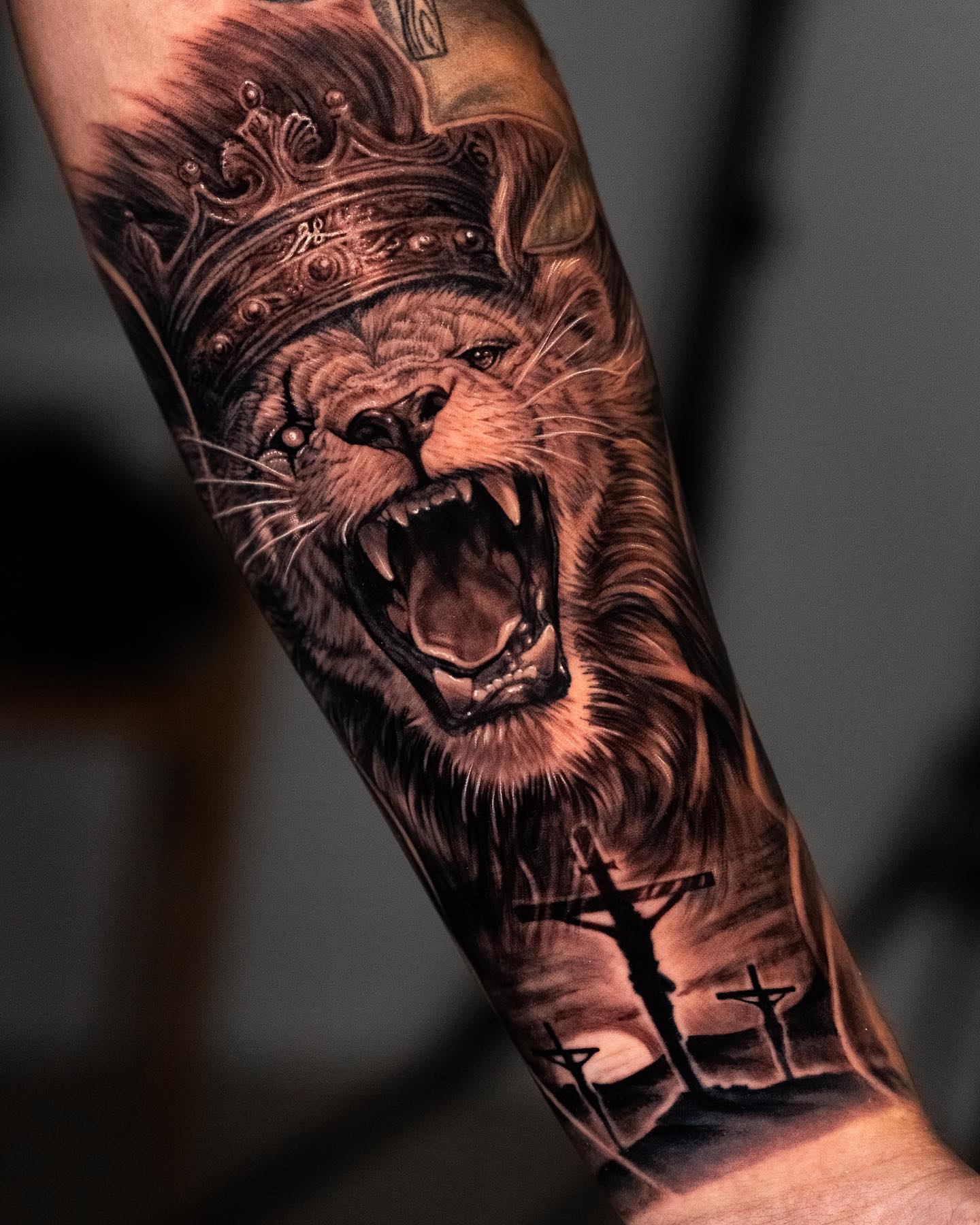 Lion with Crown Tattoo on Arm