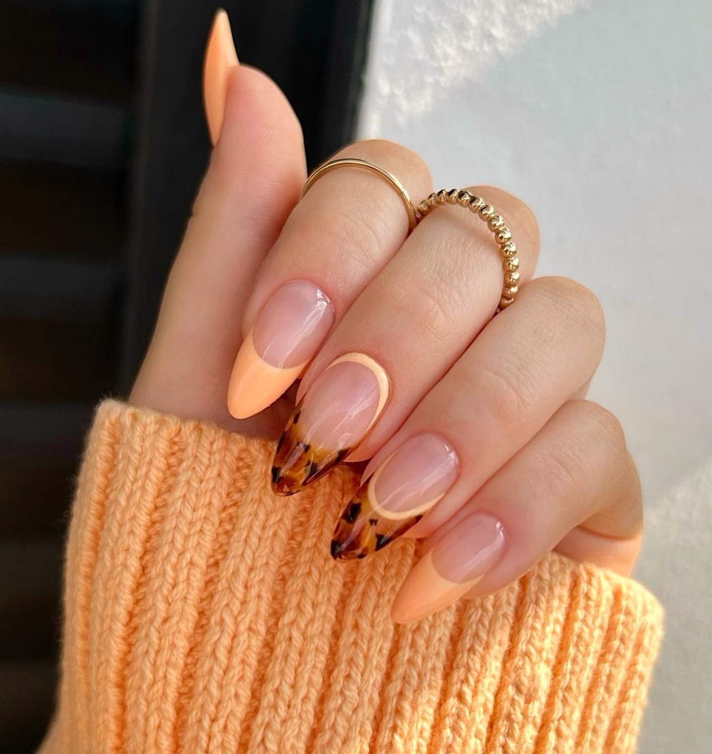 Oval Nails with Orange French Tips