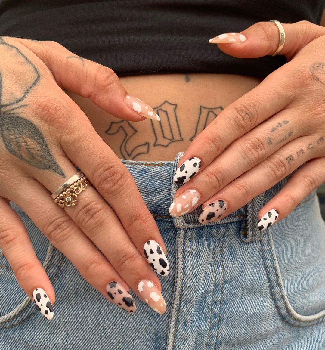Short Almond Nails with Cow Print Design