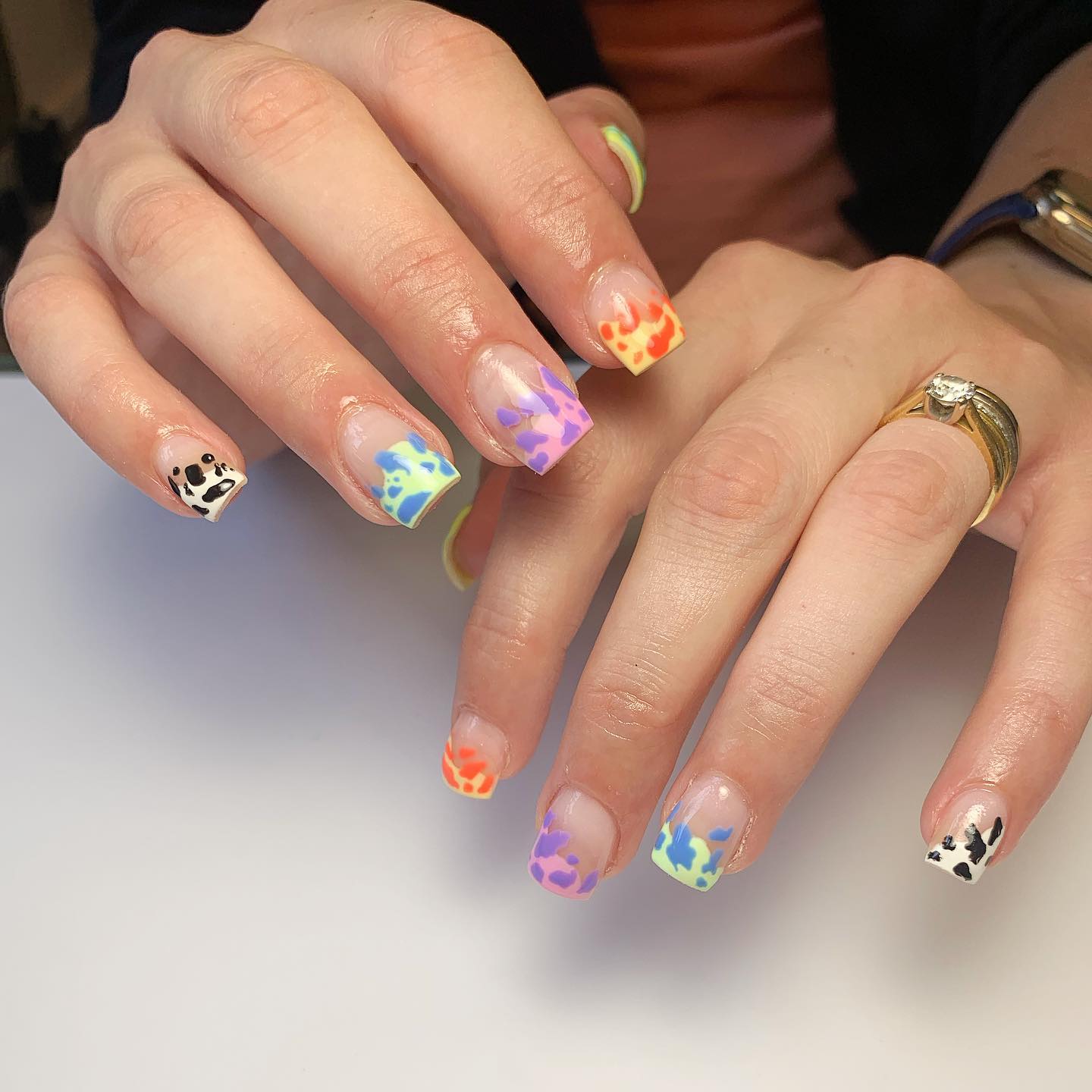 Short Square Nails with Rainbow Cow Print Design