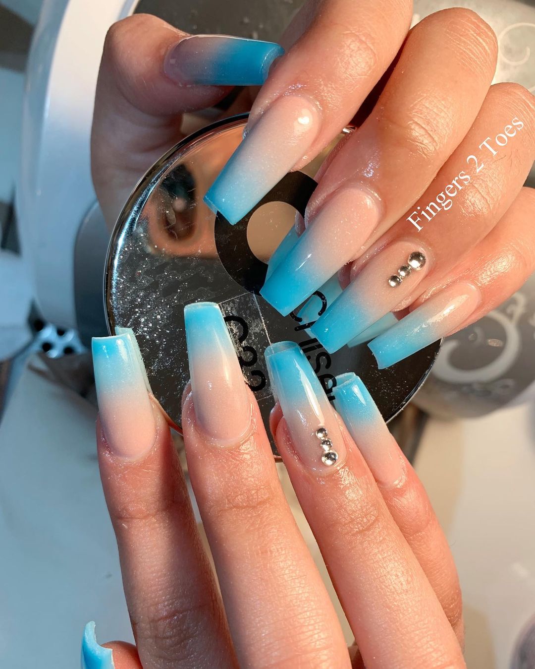 Blue and nude nail art for a refreshing appearance