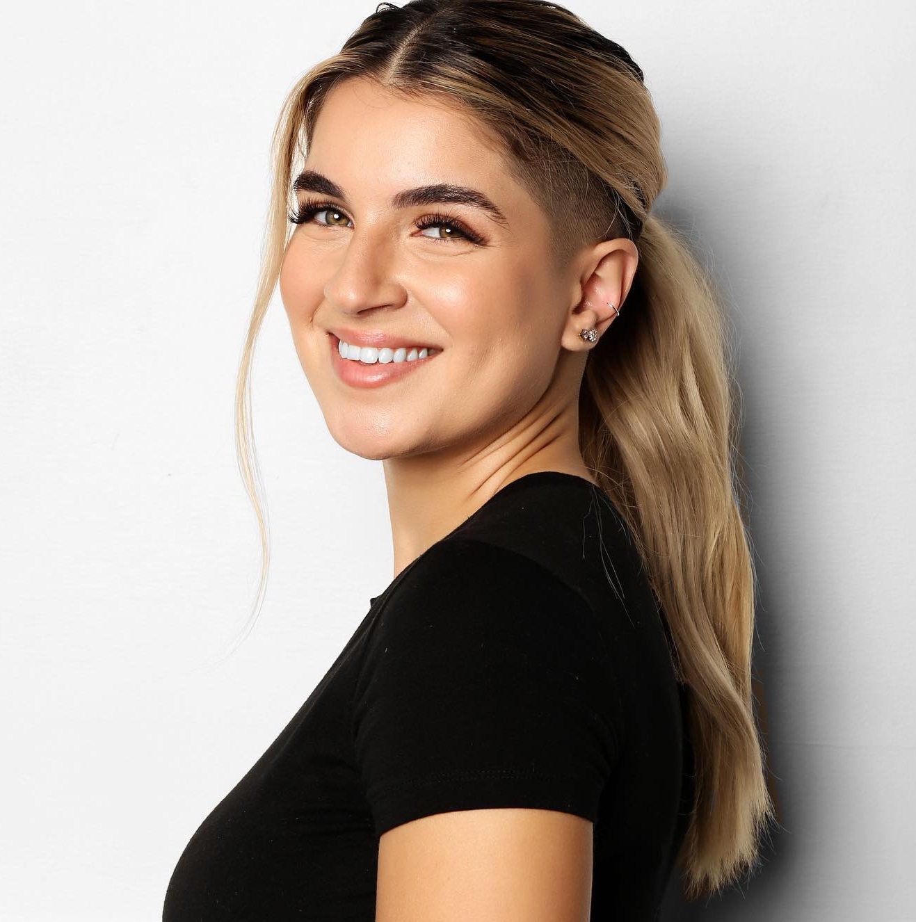 Long Blonde Hair with Side Undercut