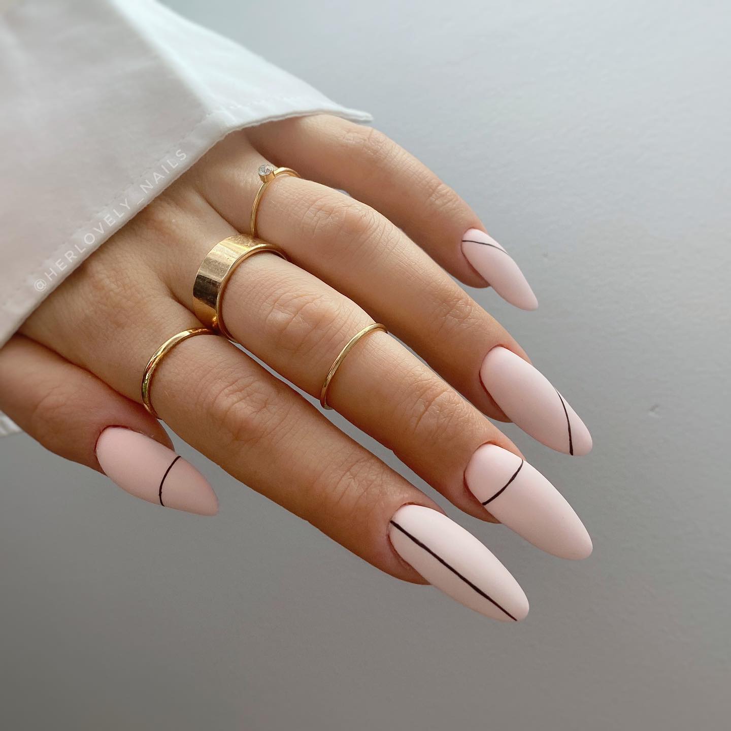 Long Round Light Pink Matte Nails with Black Lines