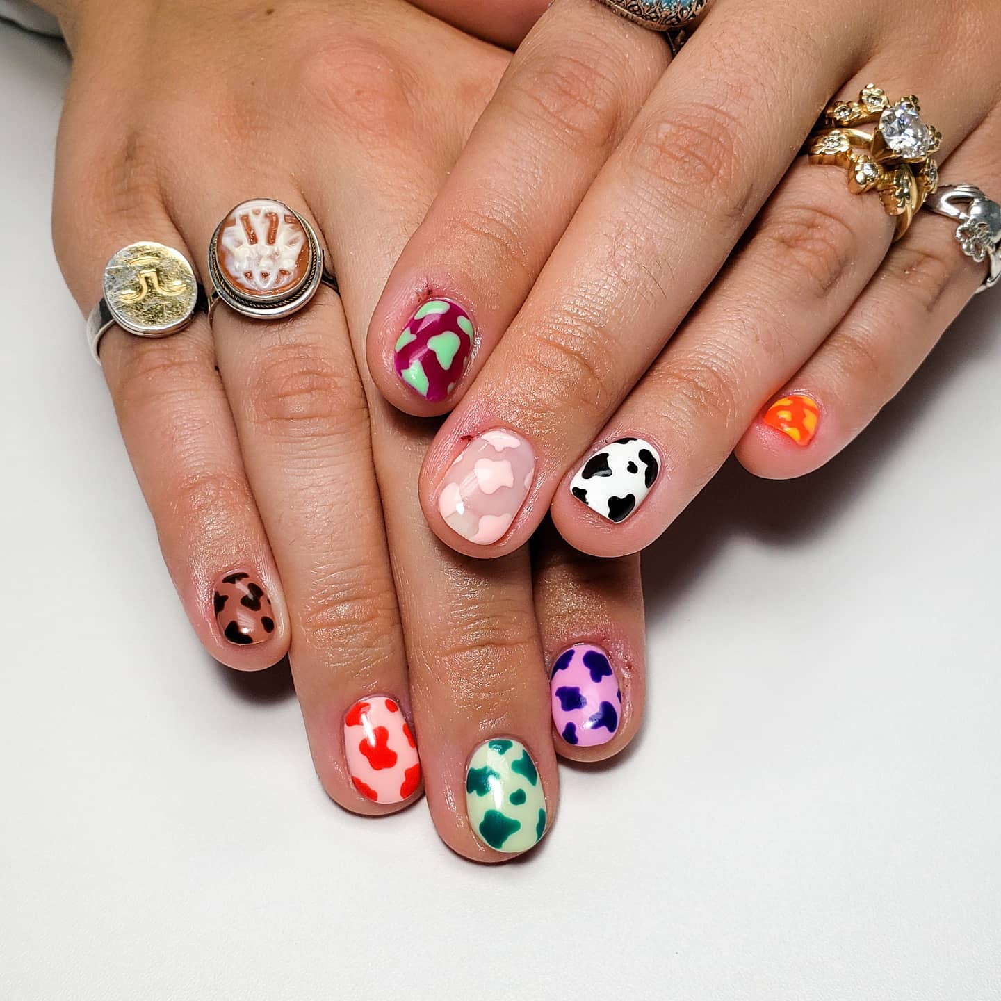 Short Round Nails with Cow Print