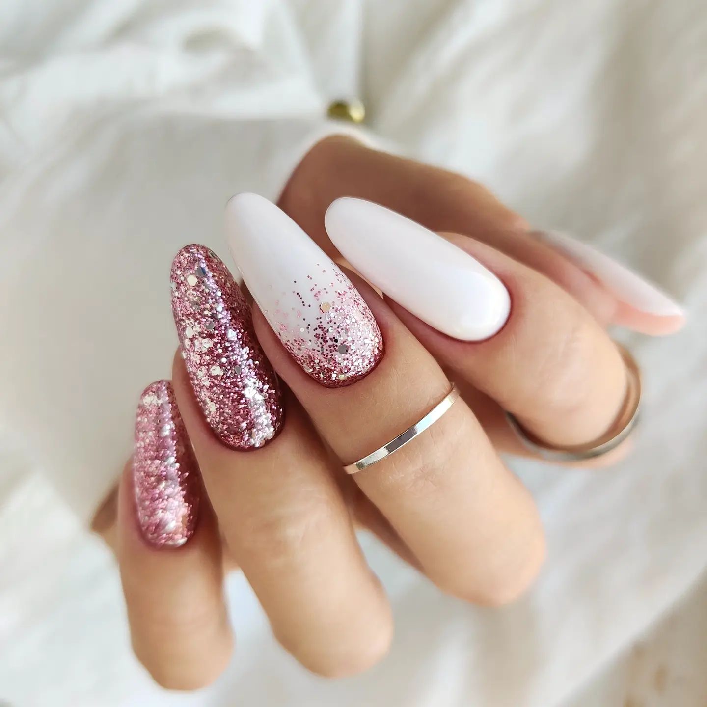 Long White Matte Nails with Pink Glitter Design