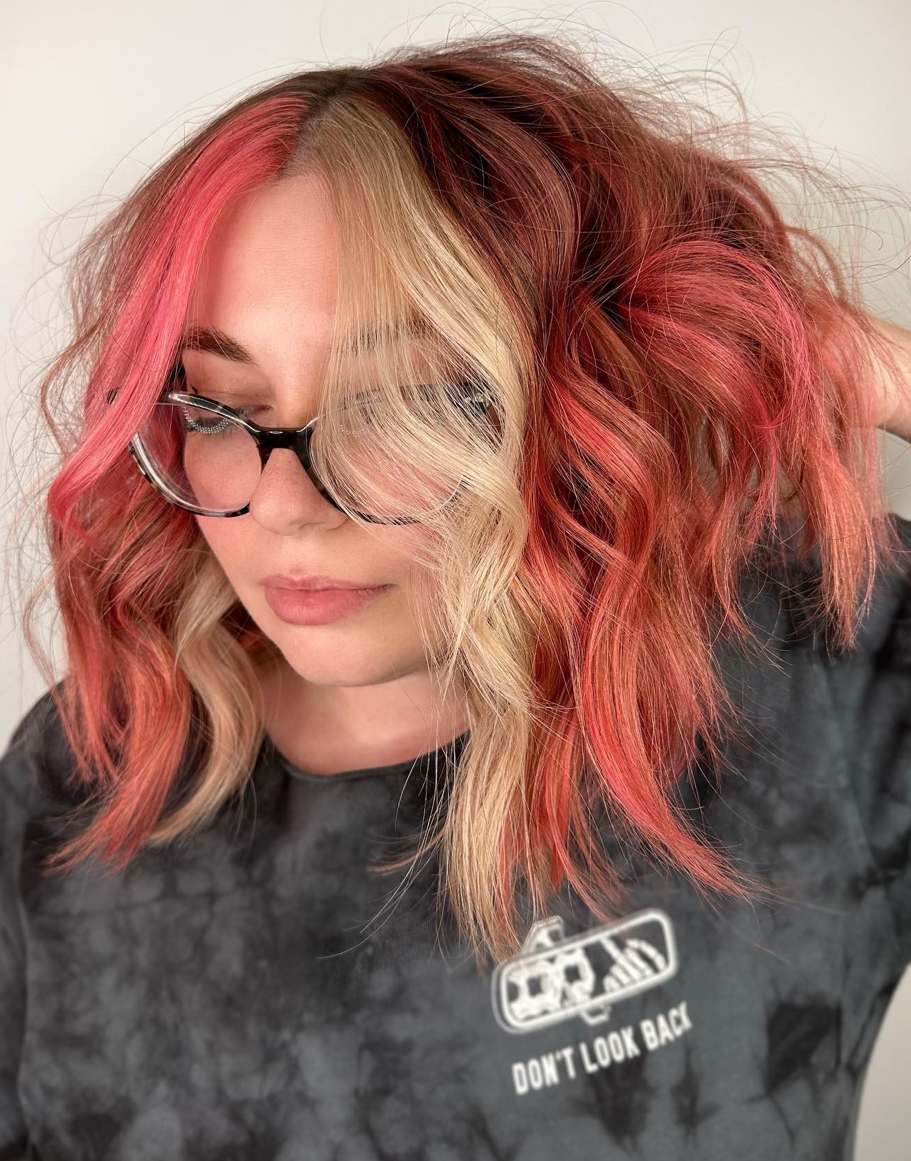 Red and Rose Gold Hues on Short Wavy Hair