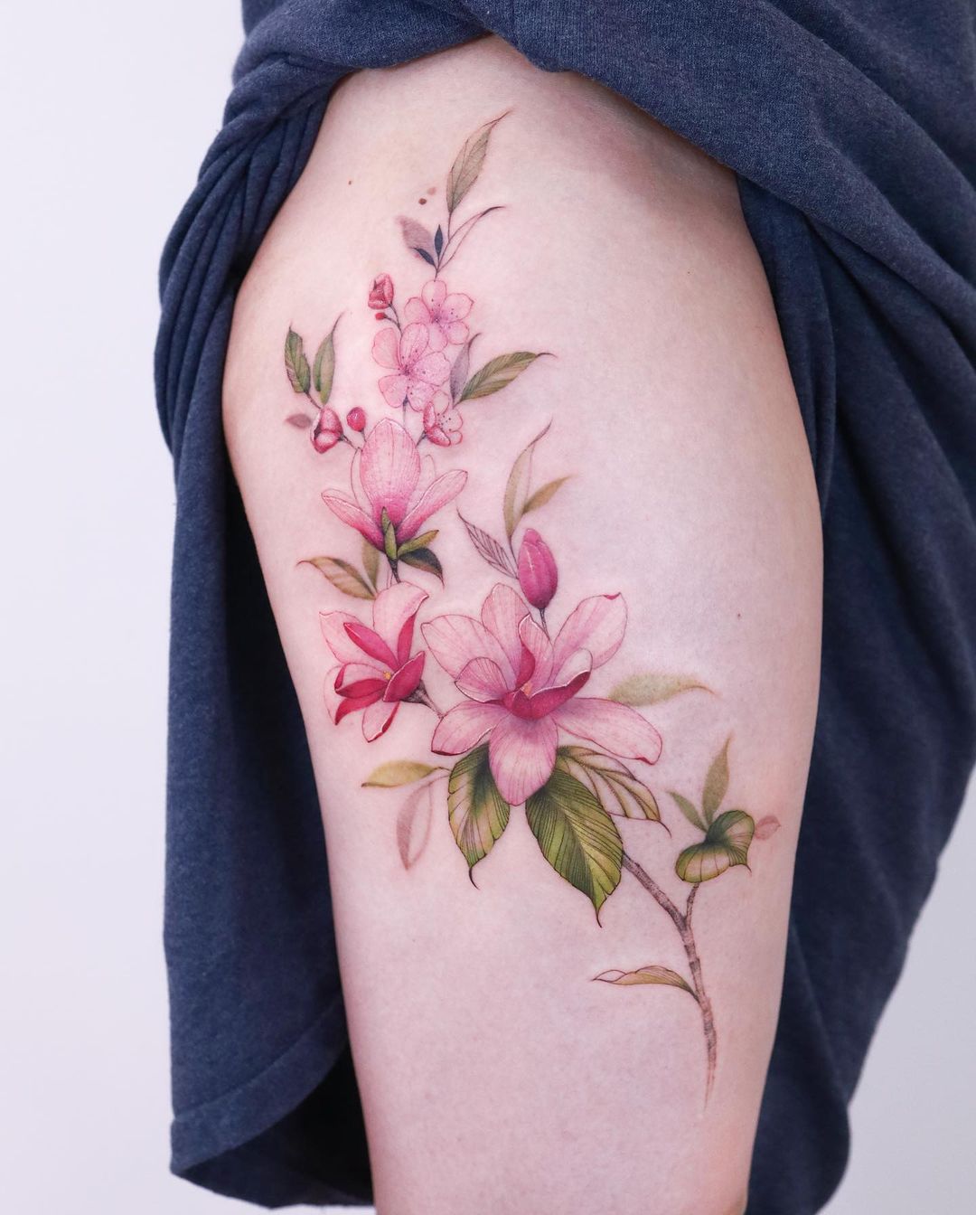 Red Magnolia Flower Tattoo on Arm