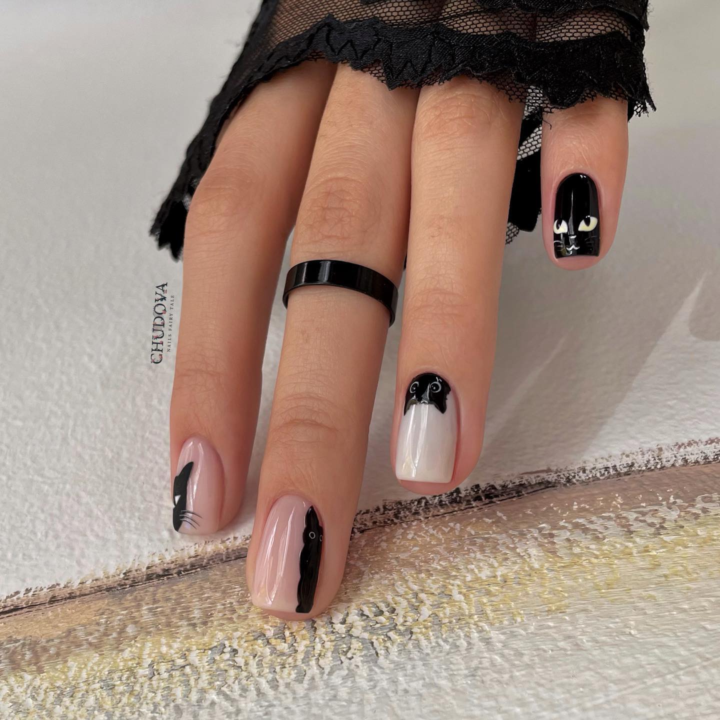 Black and Nude Nails with Cat Design