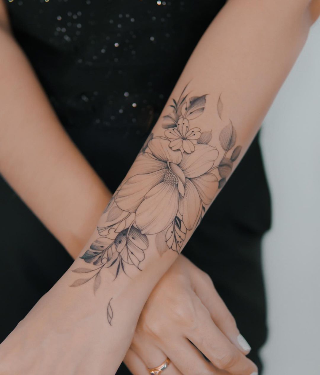Black and White Magnolia Flower Tattoo on Arm