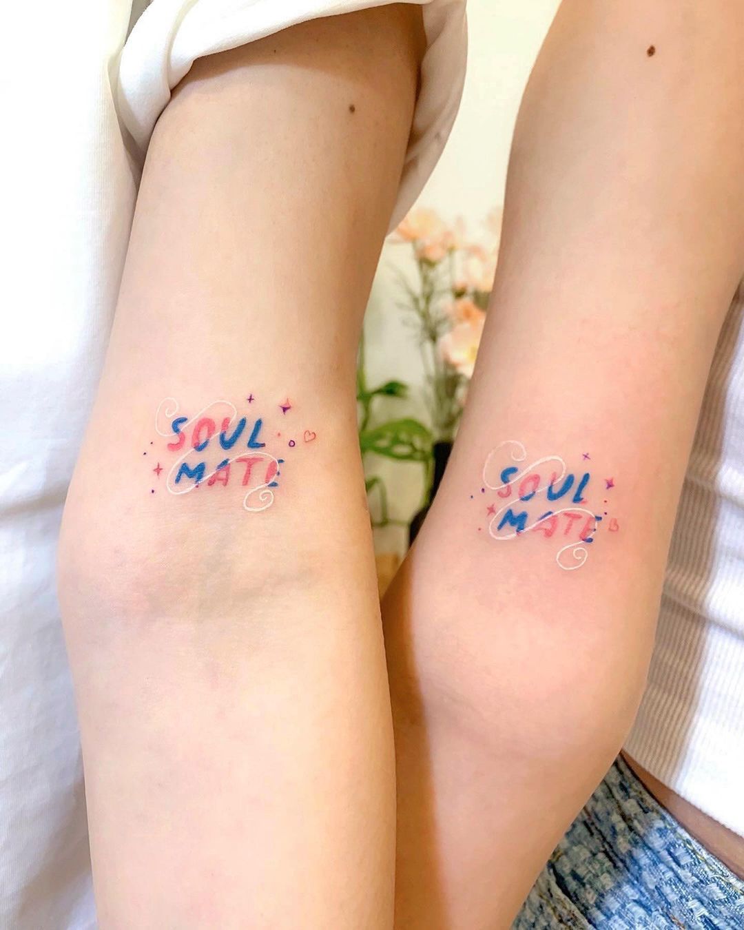 Color Matching Best Friend Tattoos on Arms