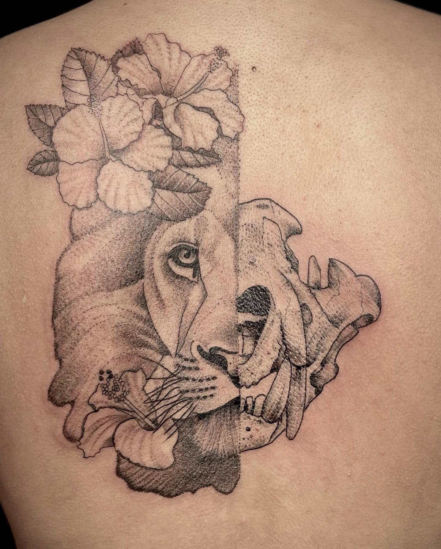 Half Lion and Half Skull Tattoo on Back