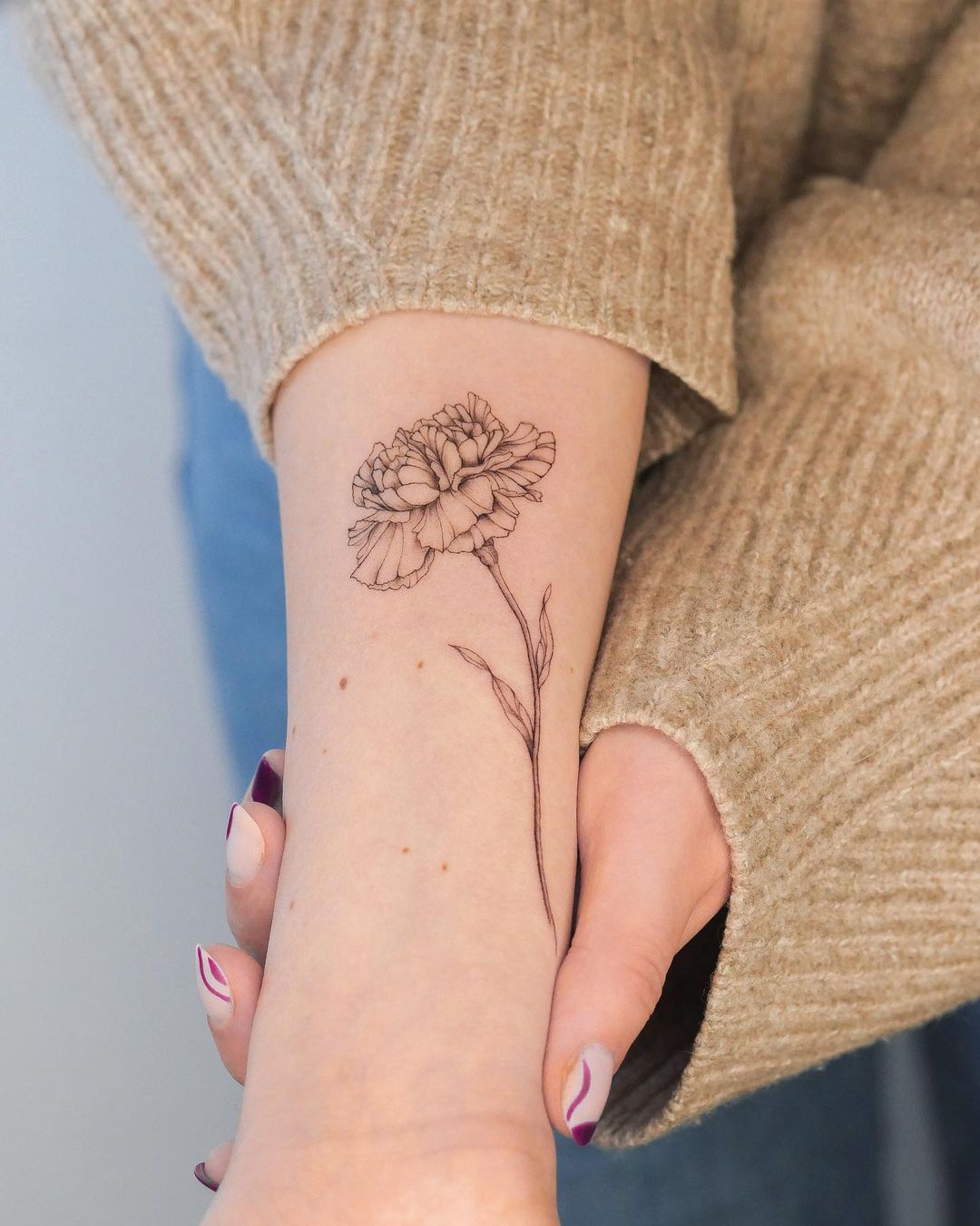 Black and White Carnation Flower Tattoo on Arm