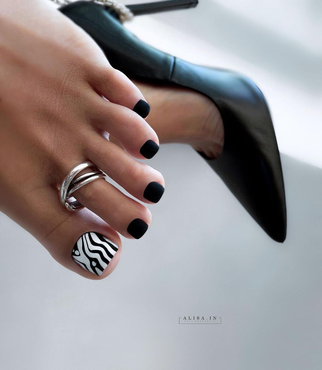 Black and White Pedicure with Zebra Design on Big Toe