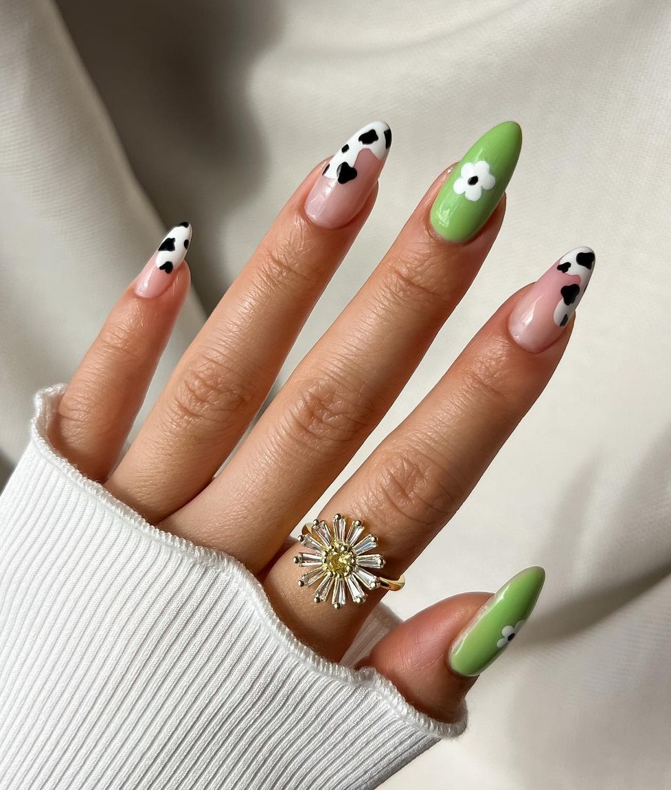 Green Nails with Cow Print Design